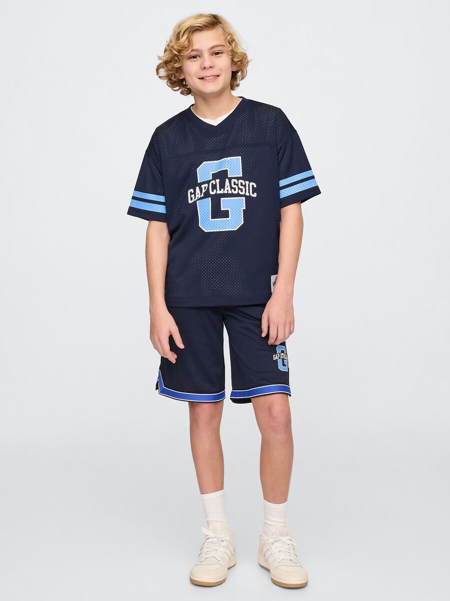 Maglia sportiva blu con logo e dettagli in azzurro Boy_1