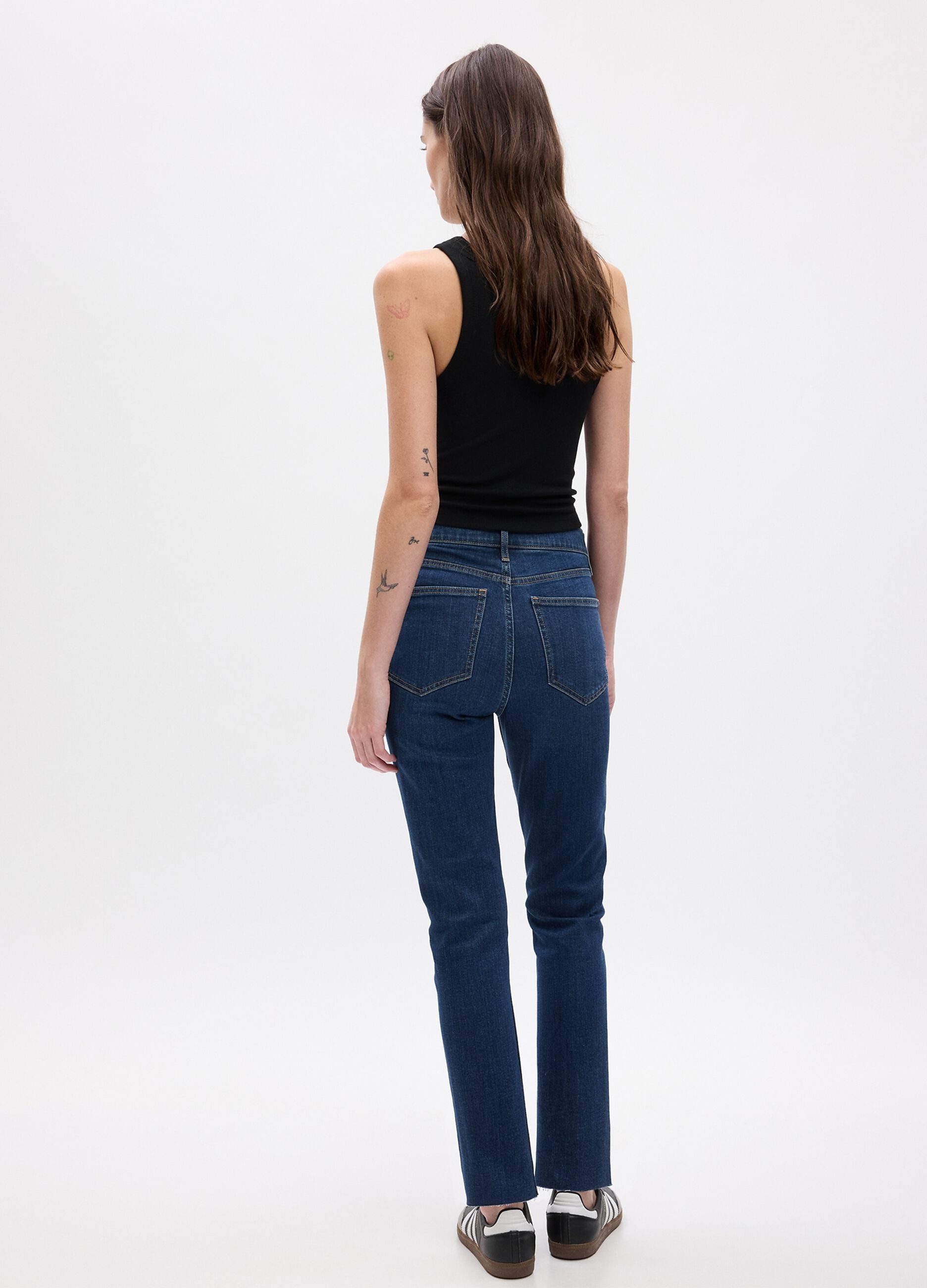 Jeans slim fit a vita alta con orlo a vivo_1