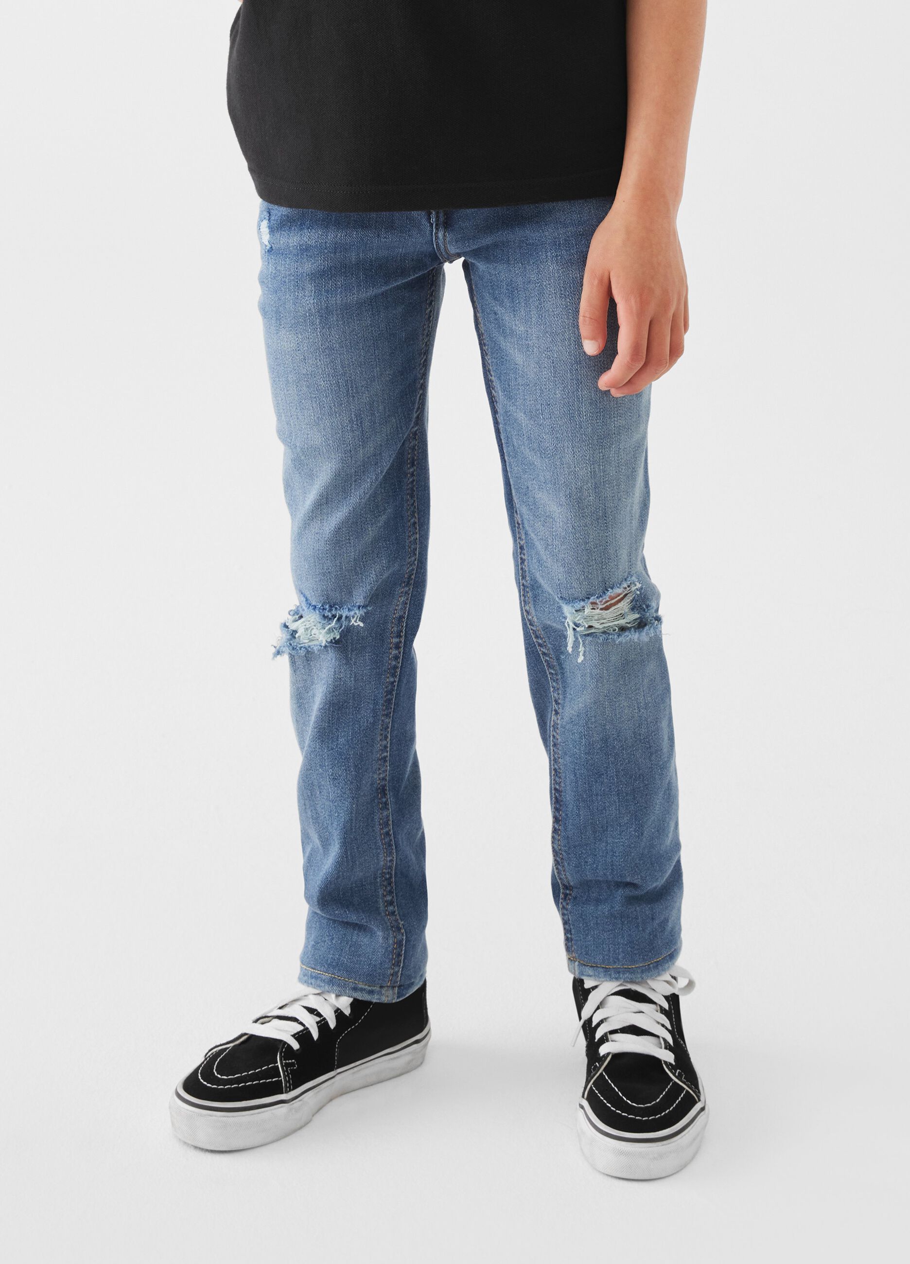 Jeans skinny fit con abrasioni_1