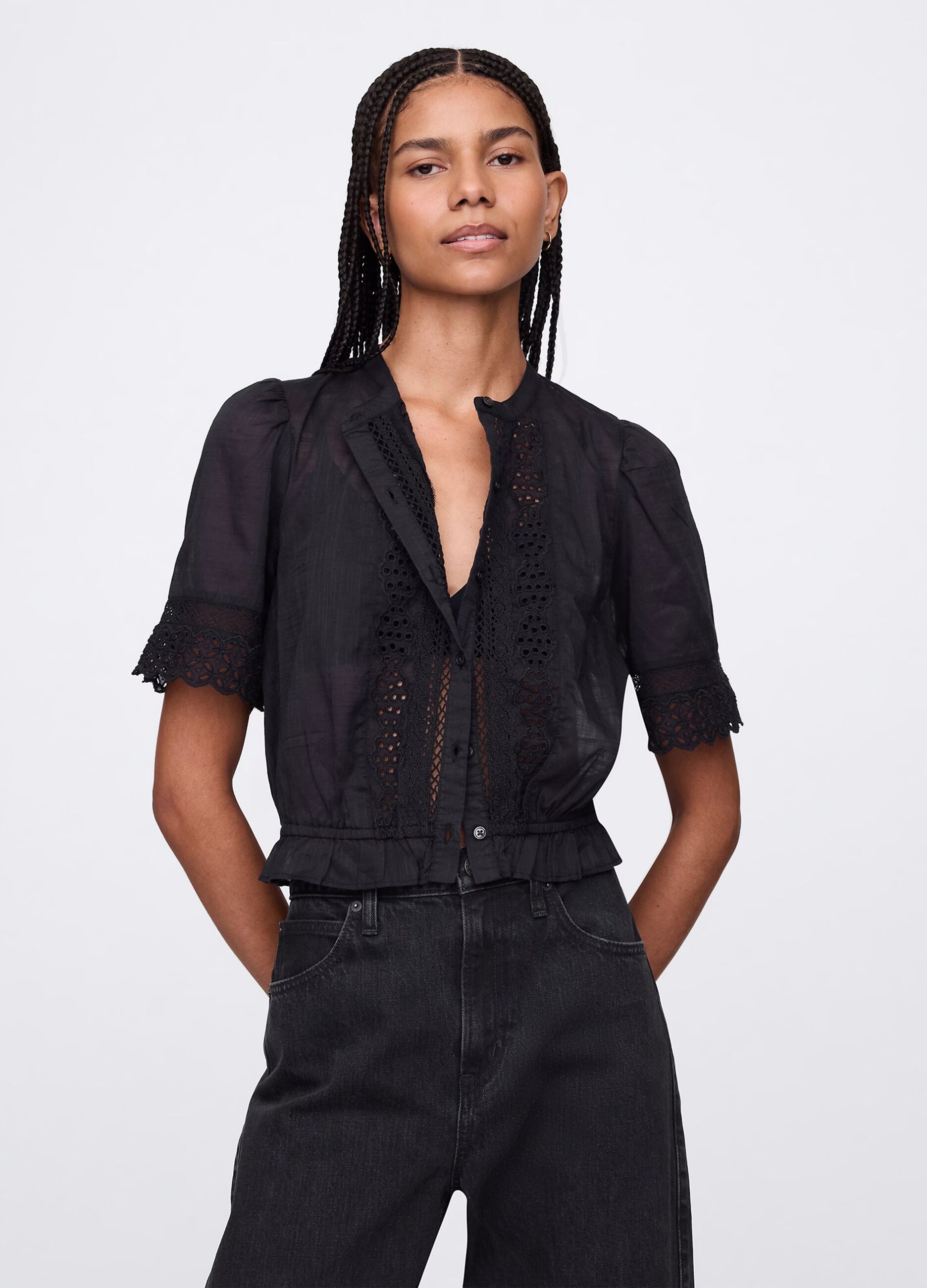Blusa nera ricamata in cotone