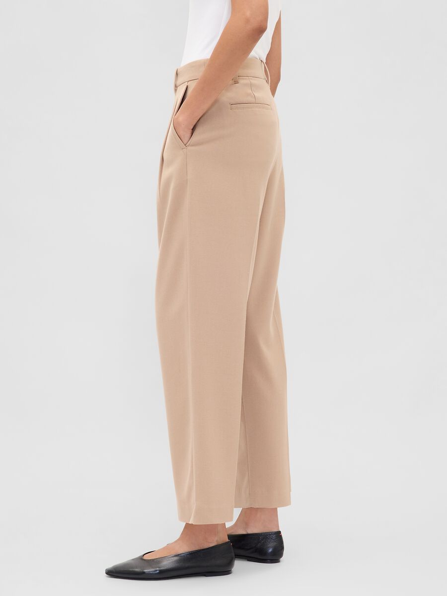 Pantaloni beige elasticizzati Donna_3