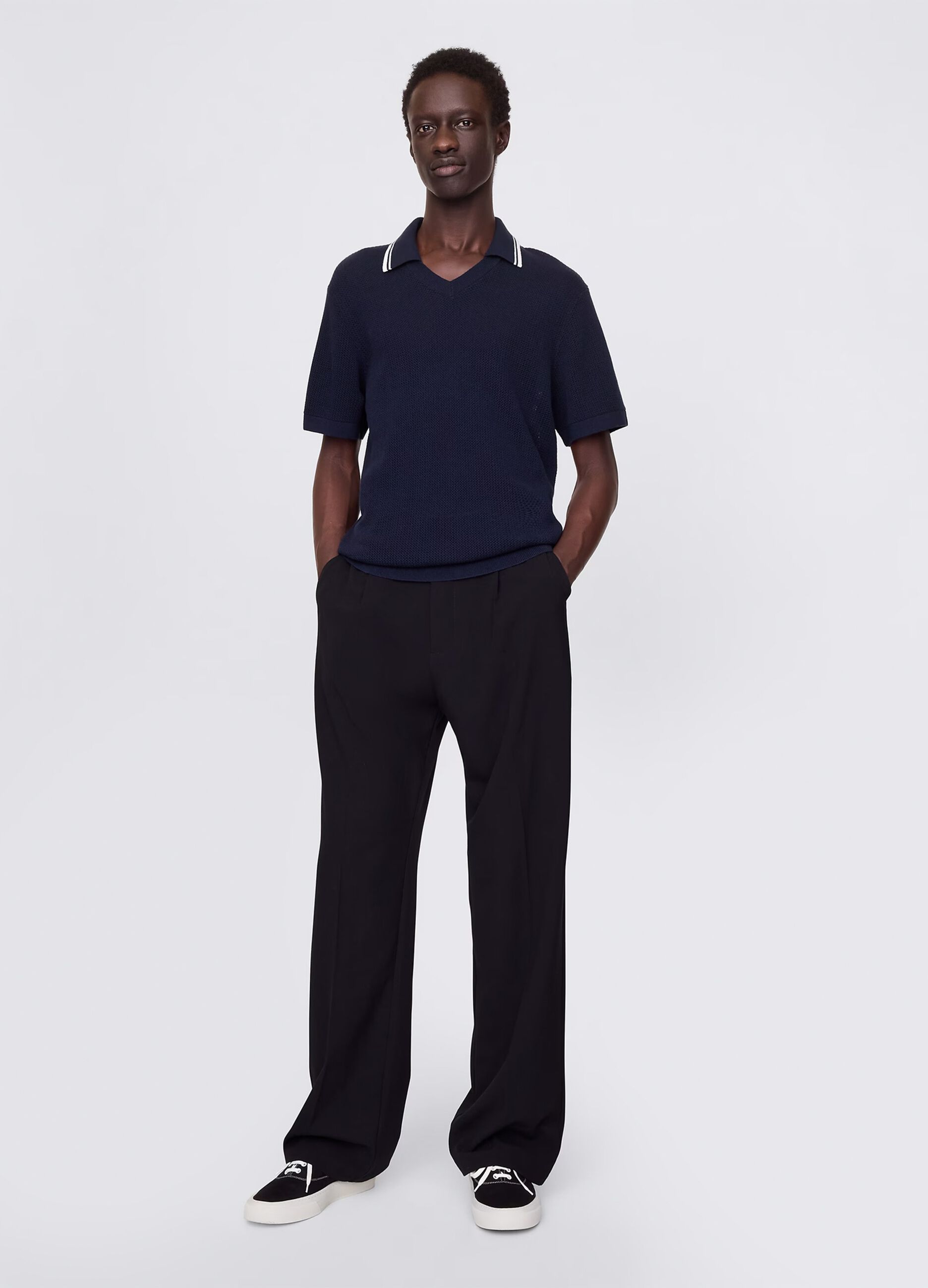 Polo traforata in cotone blu_1