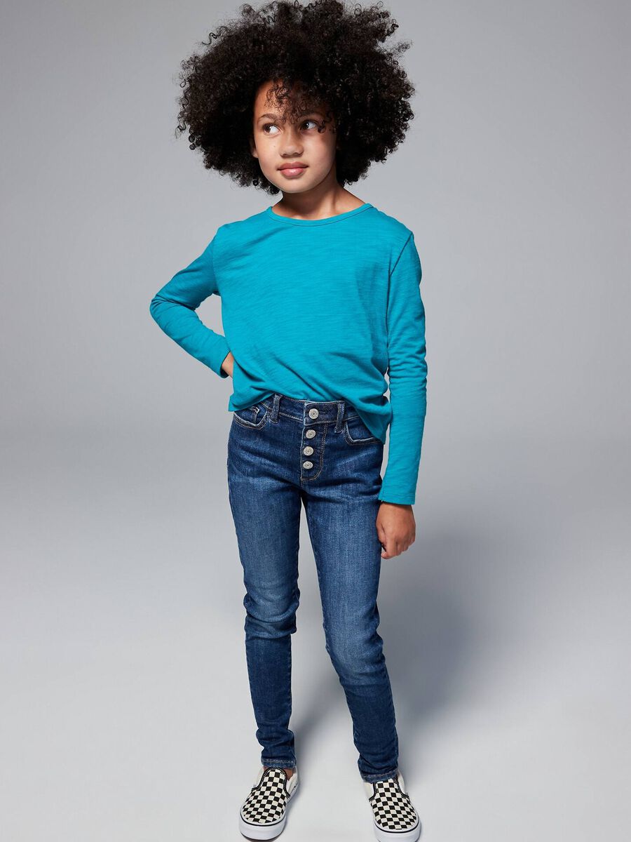 Jeans slim fit con bottoni automatici Bambina_0