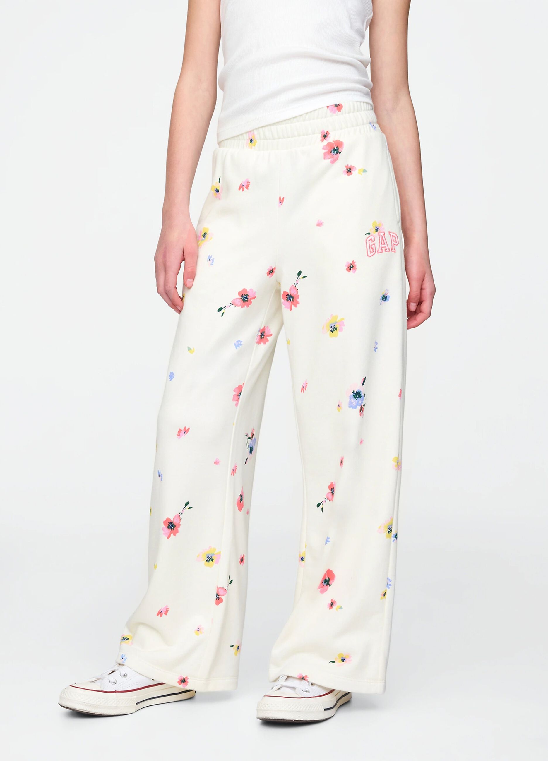 Joggers bianchi a gamba larga con stampa fiori_1