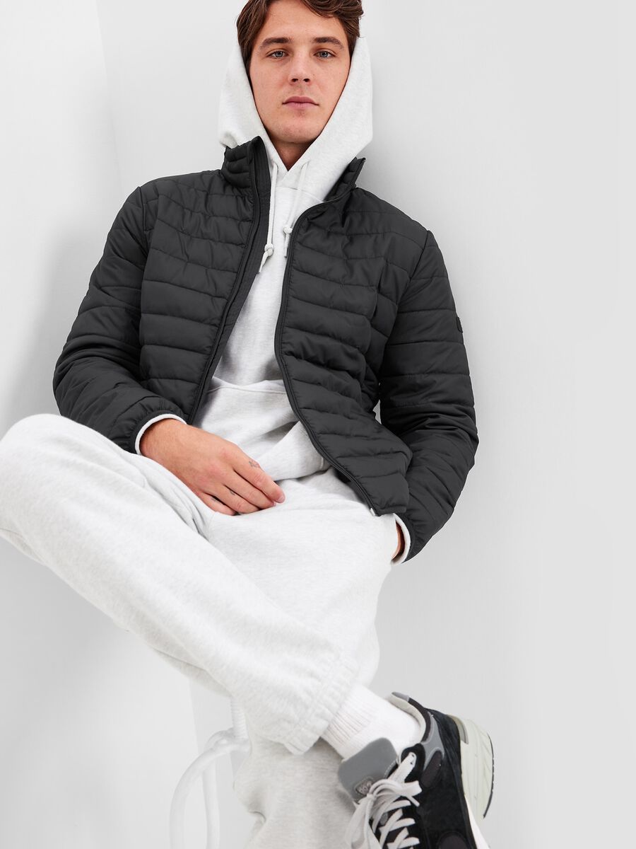 Full-zip puffer jacket with high neck and logo patch Man_0