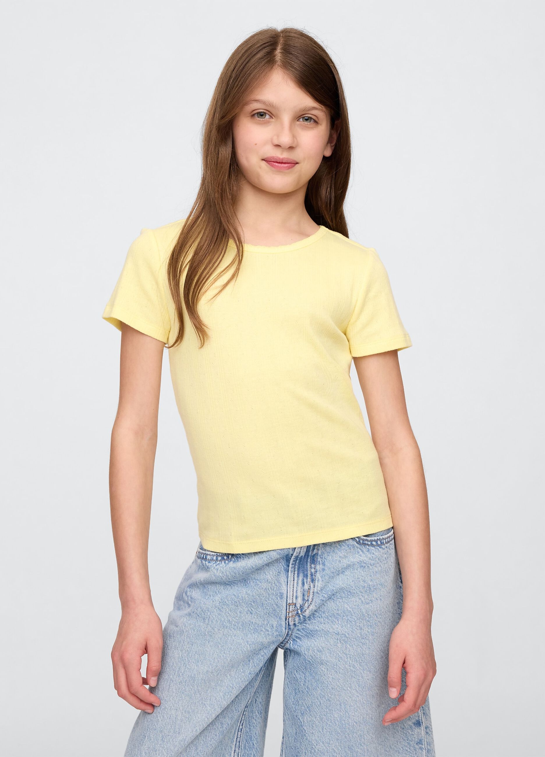 T-shirt a coste gialla con taglio aderente