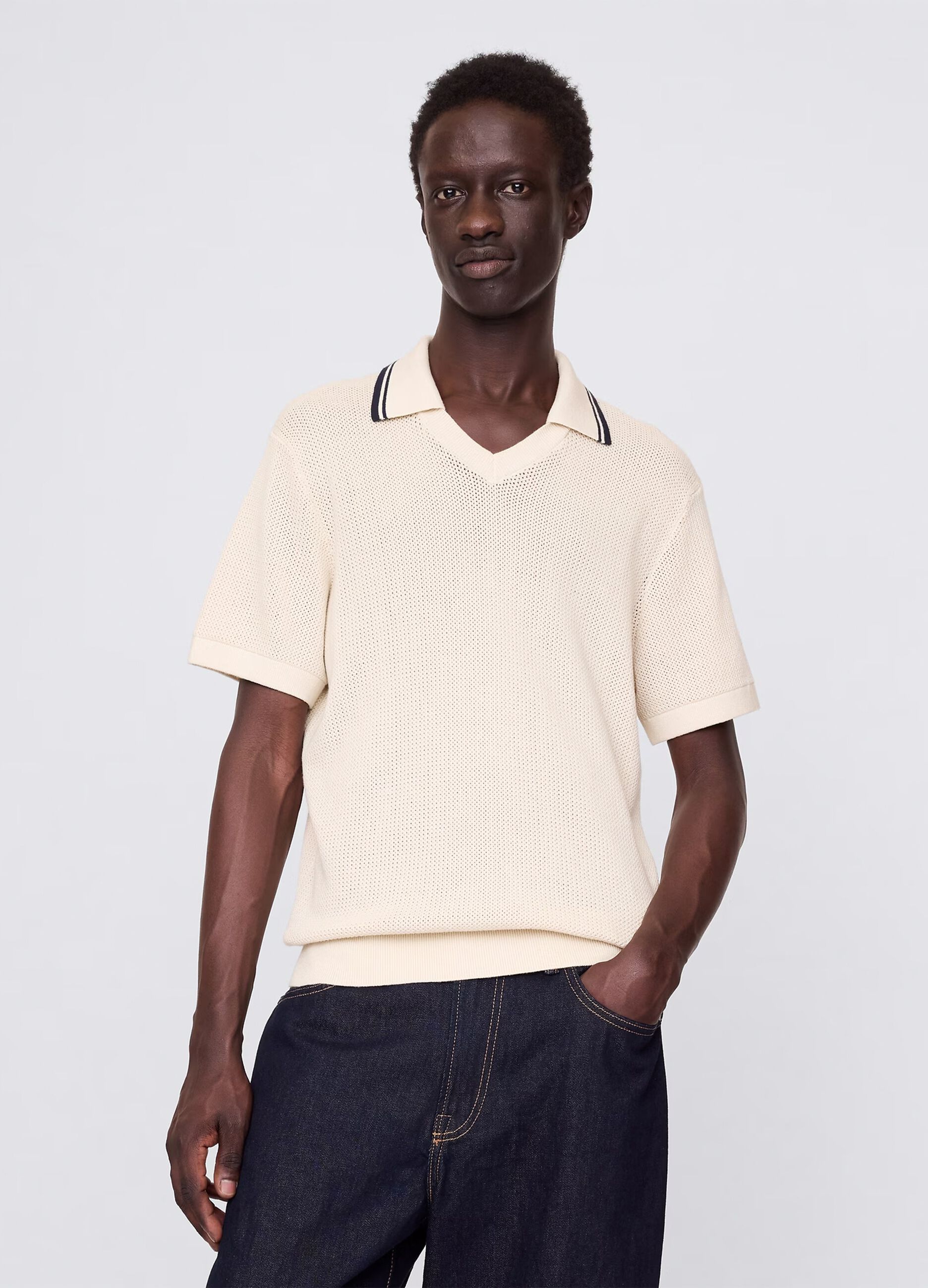 Polo traforata in cotone beige 
