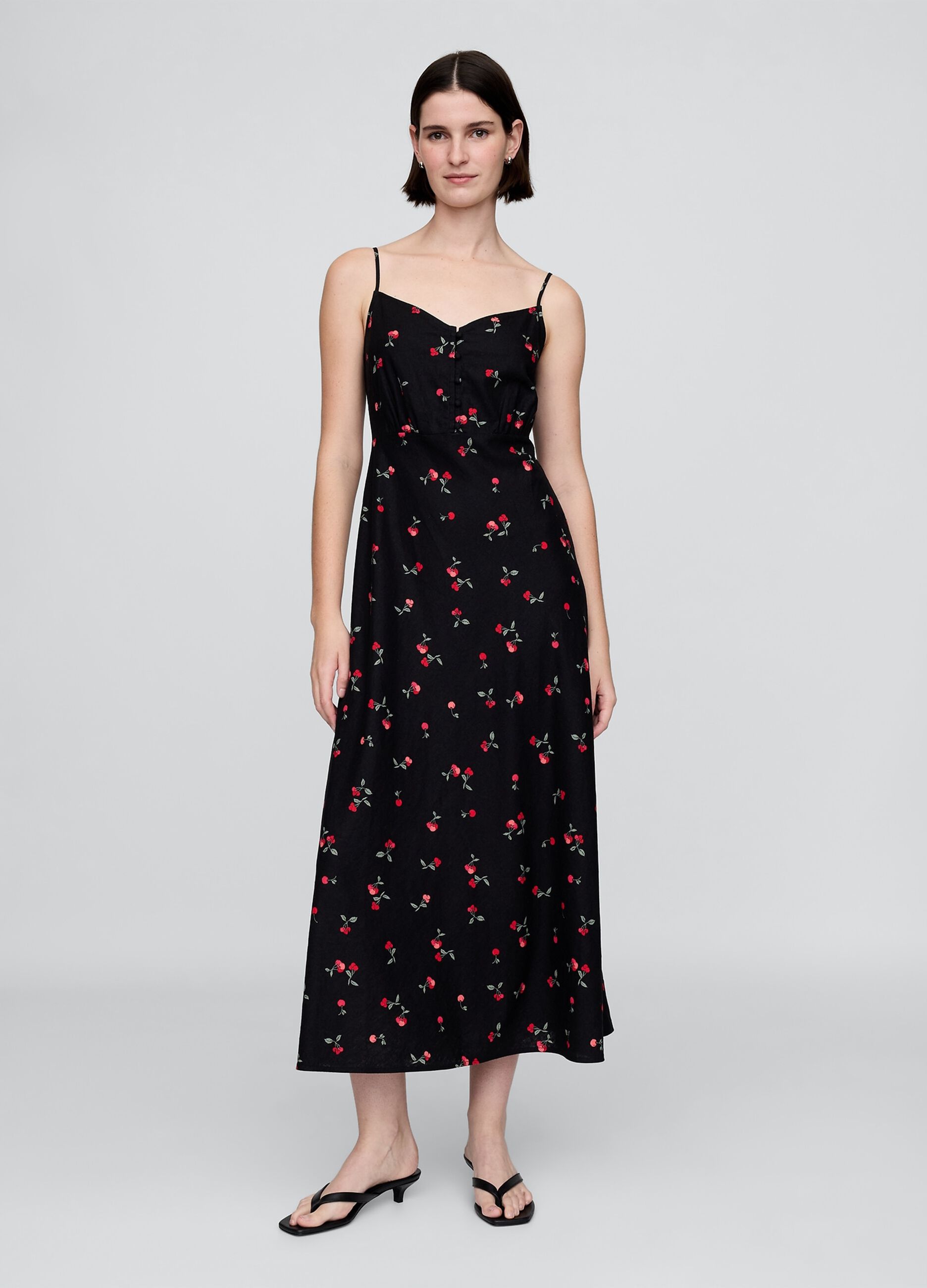 Vestito lungo nero con fantasia floreale