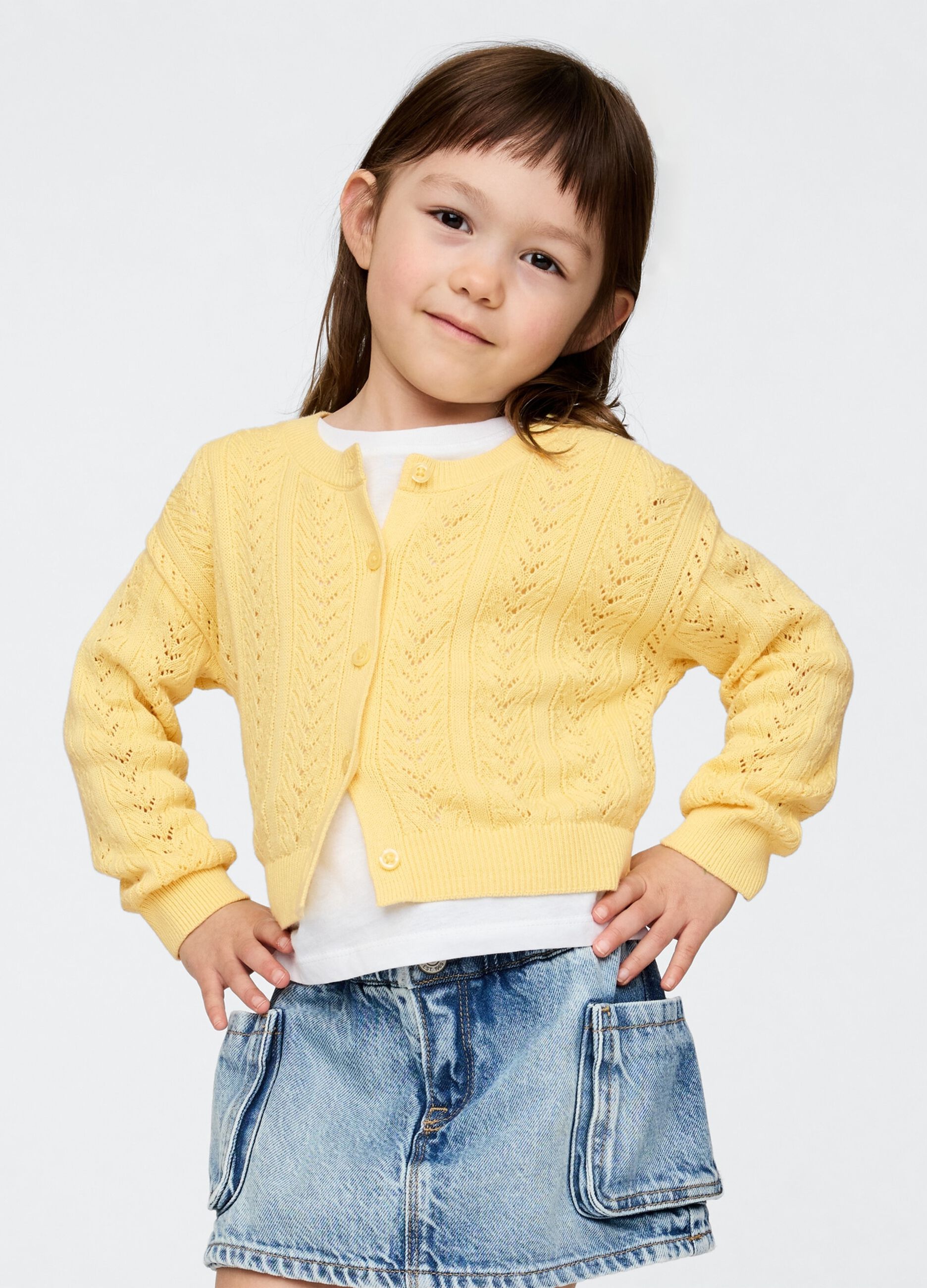 Cardigan giallo in maglia traforata