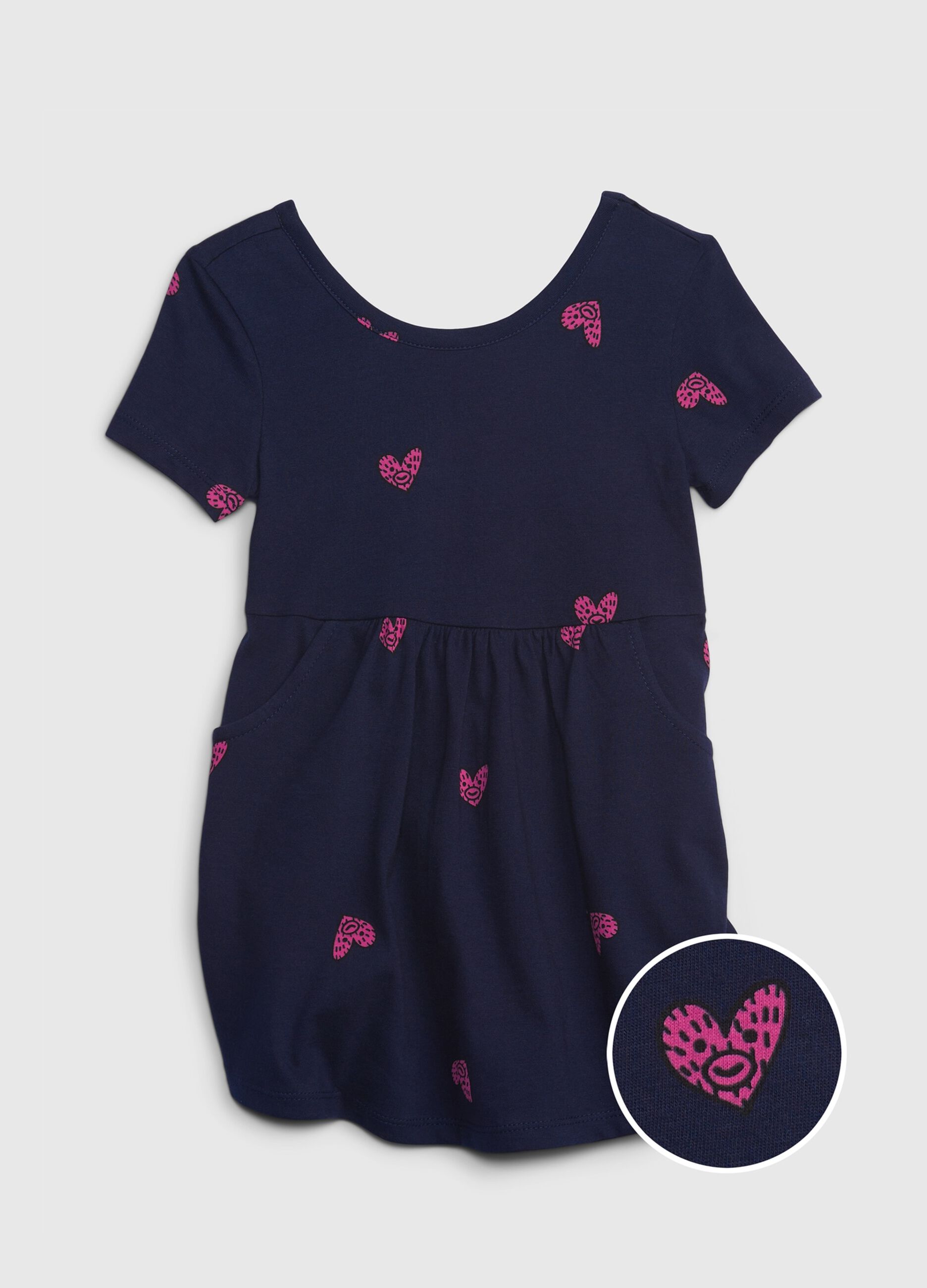 Short dress with heart print.