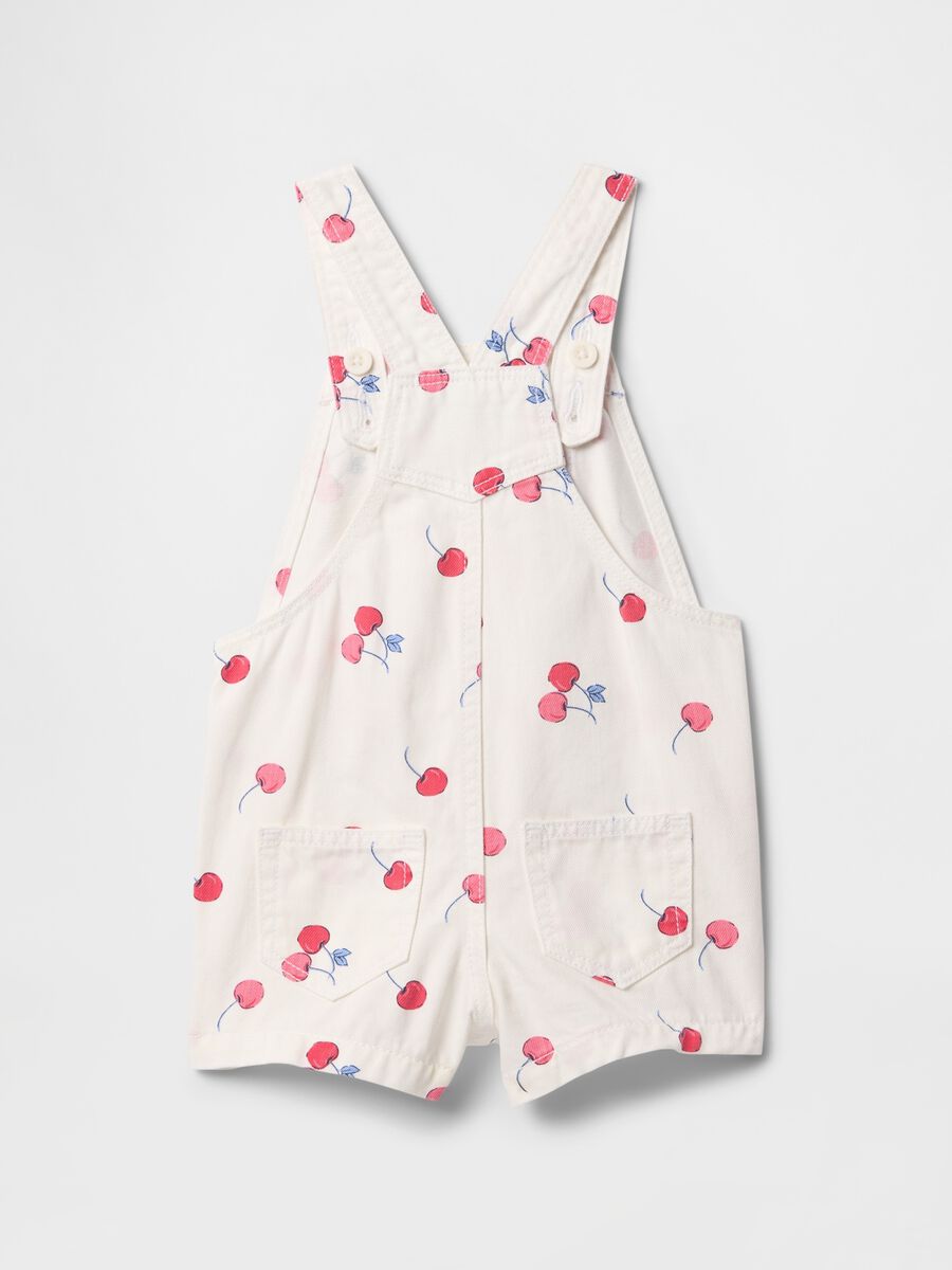 Salopette bianca con stampa ciliegie GAP Kids Bimba_1