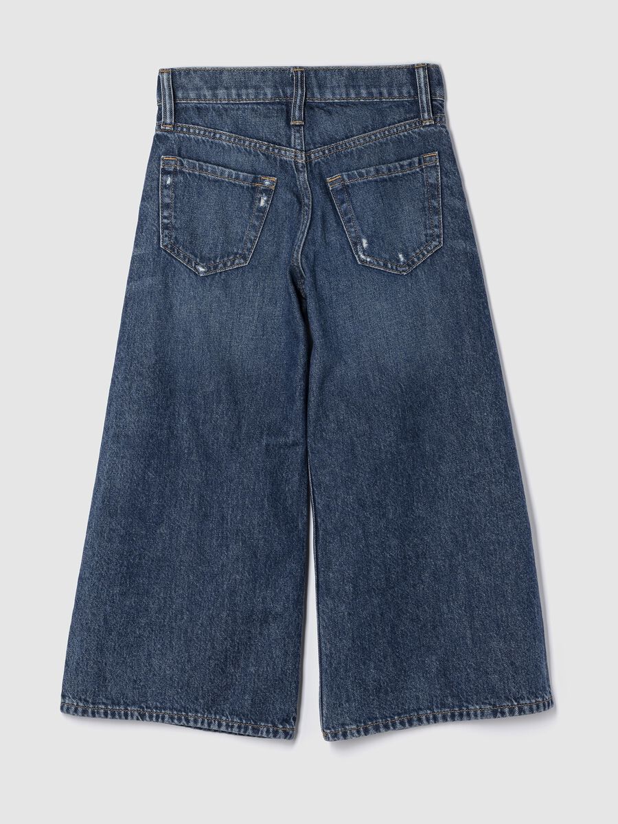Jeans baggy con micro abrasioni Bambina_1