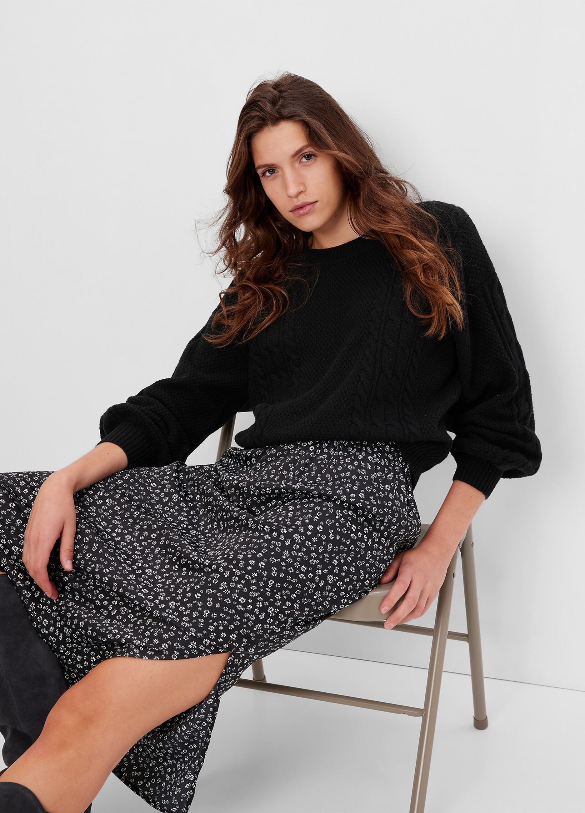 Oversized pullover with cable-knit motif