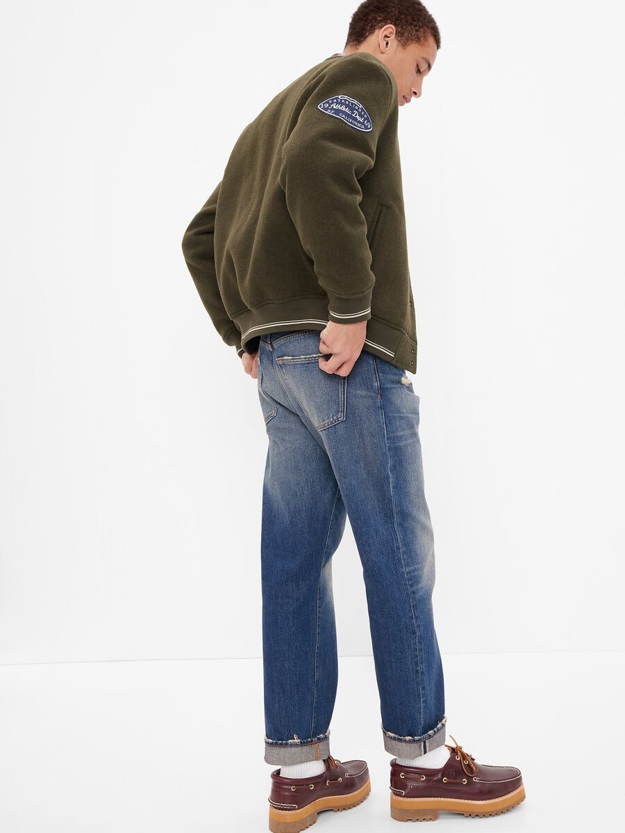 Straight fit jeans with worn look Man_1