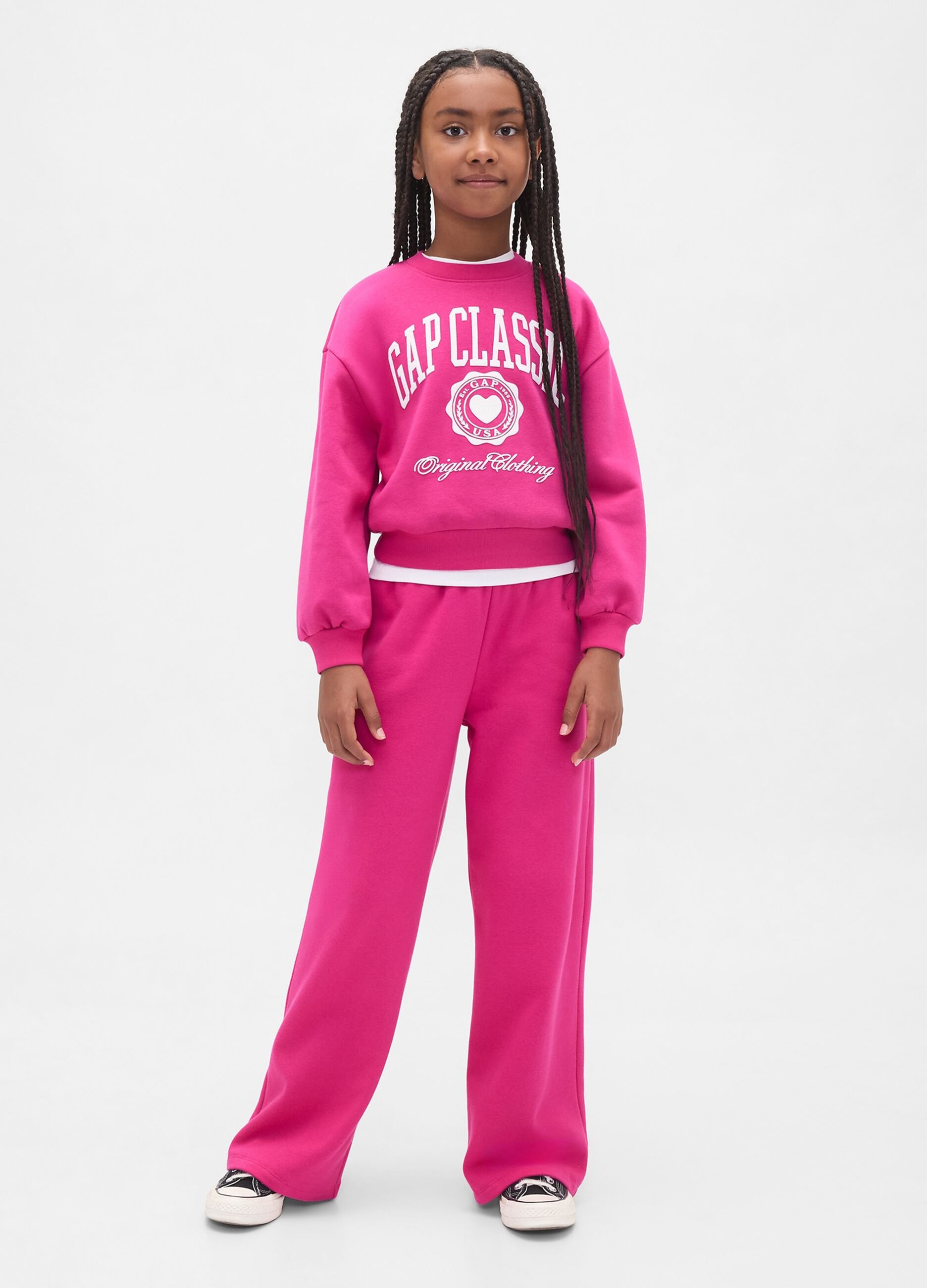 Pantaloni rosa per bambina in misto cotone e poliestere