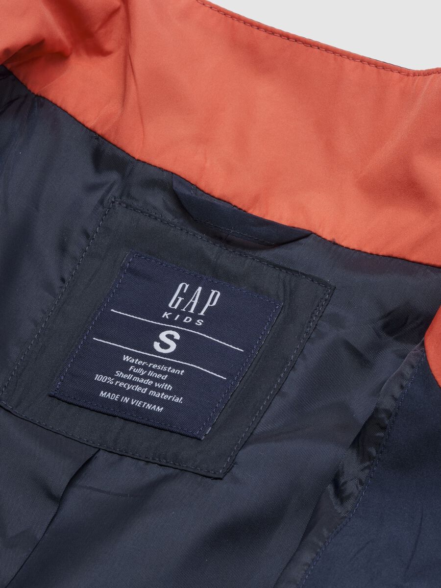Light blue jacket with orange and grey accents Boy_3