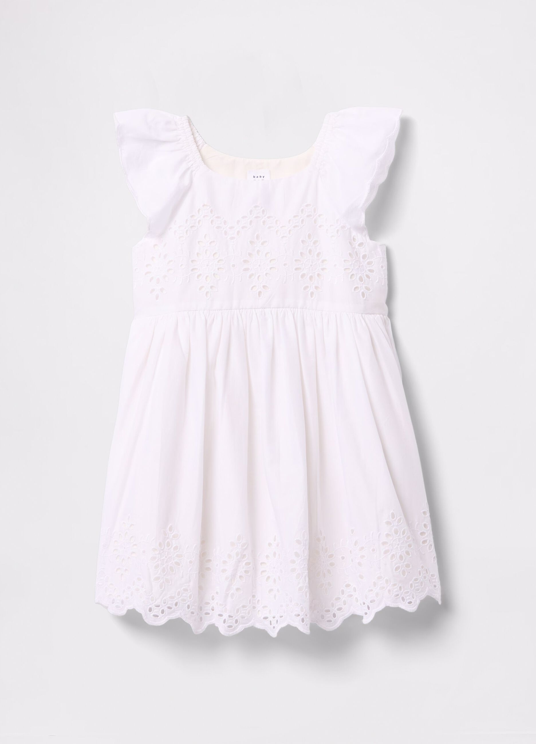 Abito bianco in cotone con fiori traforati_1