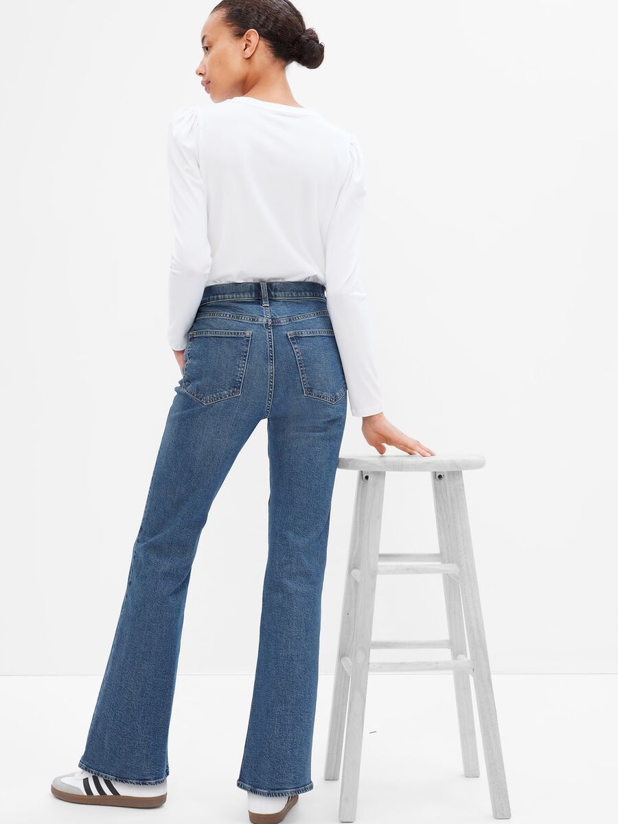 Flare-fit jeans with misdyed effect Woman_1