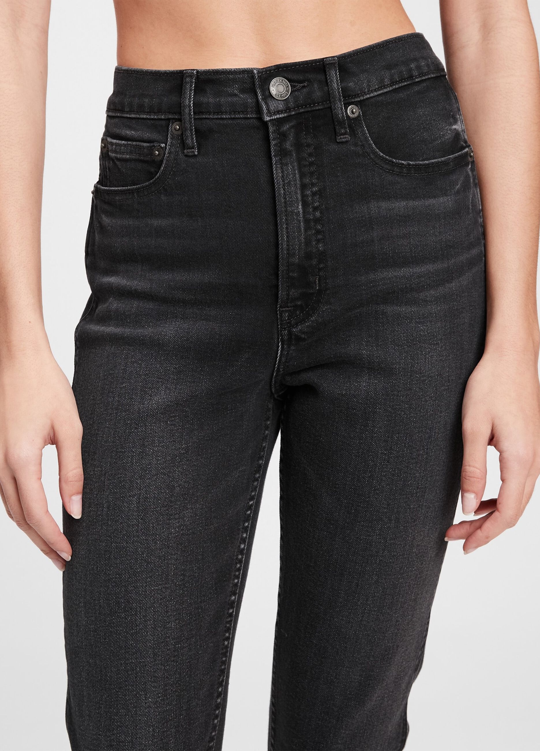 Jeans slim fit a vita alta con orlo a vivo