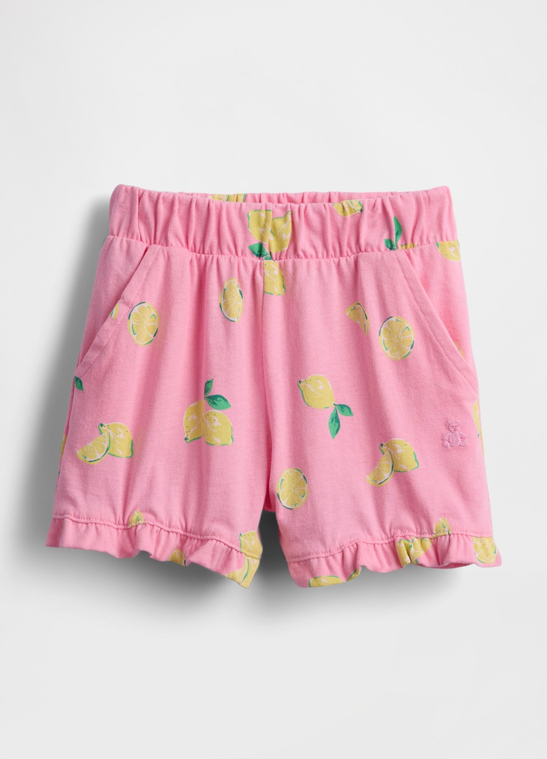 Pantaloncini rosa con stampa limoni