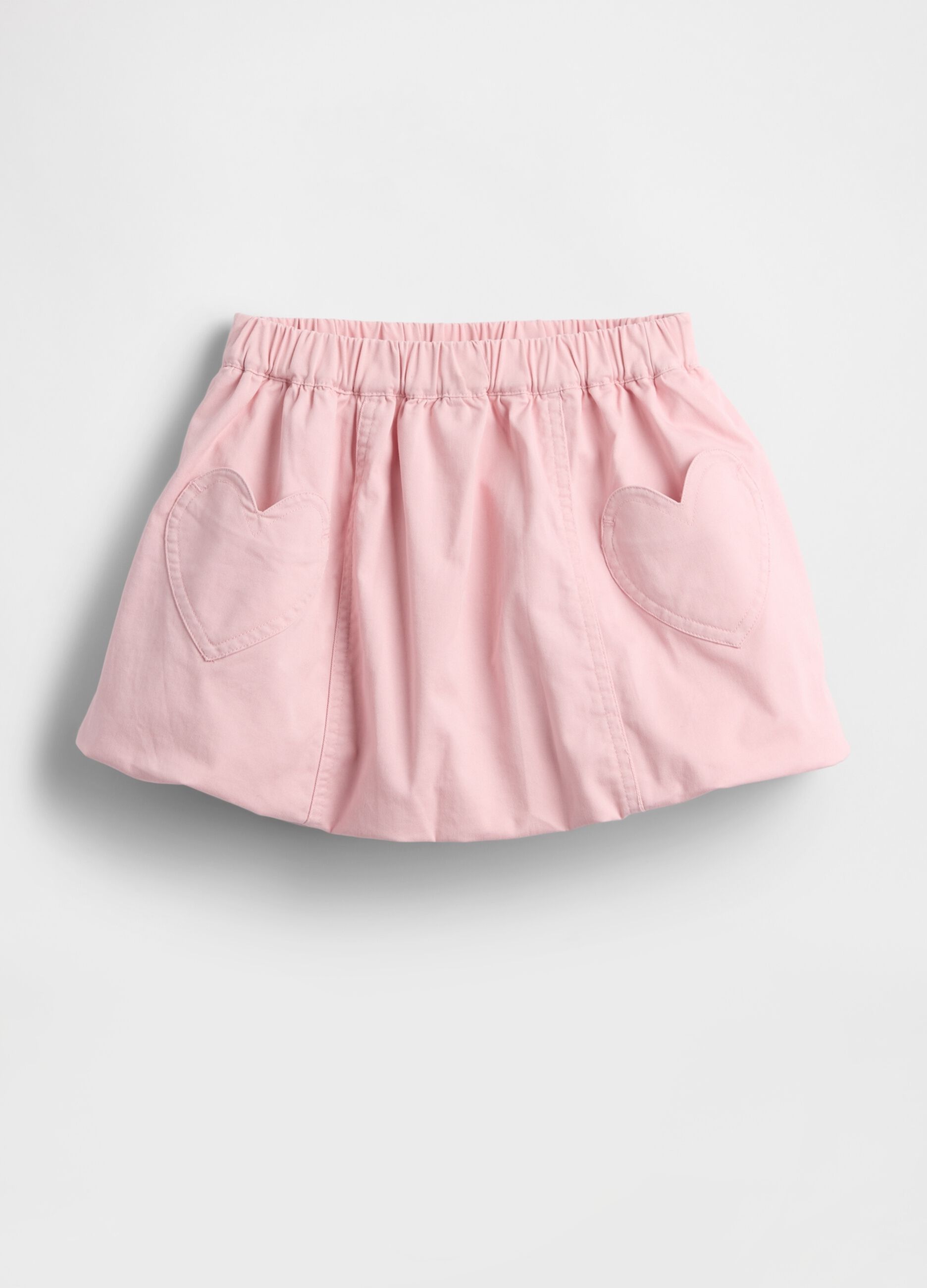 Gonna rosa elasticizzata con tasche a cuore