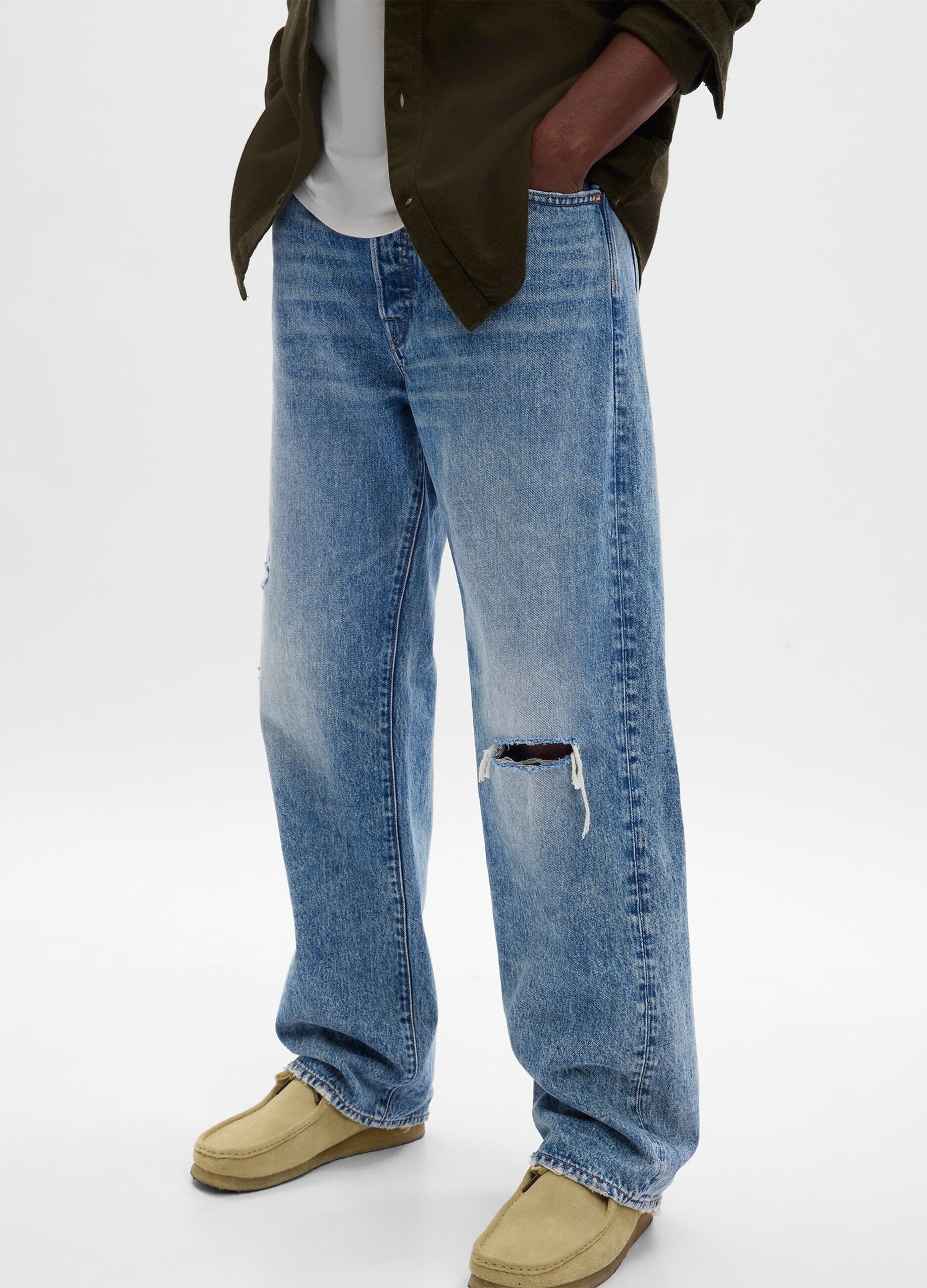 Jeans loose fit acid wash con strappo_1