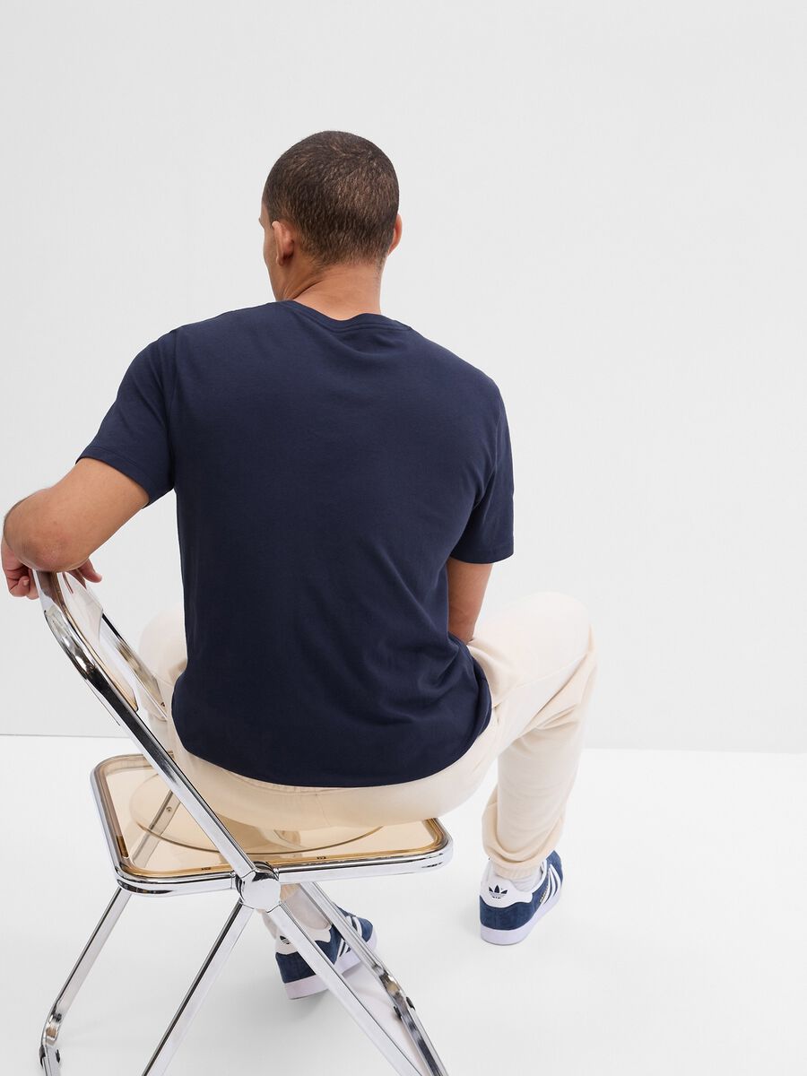 T-shirt con stampa logo e lettering Uomo_1