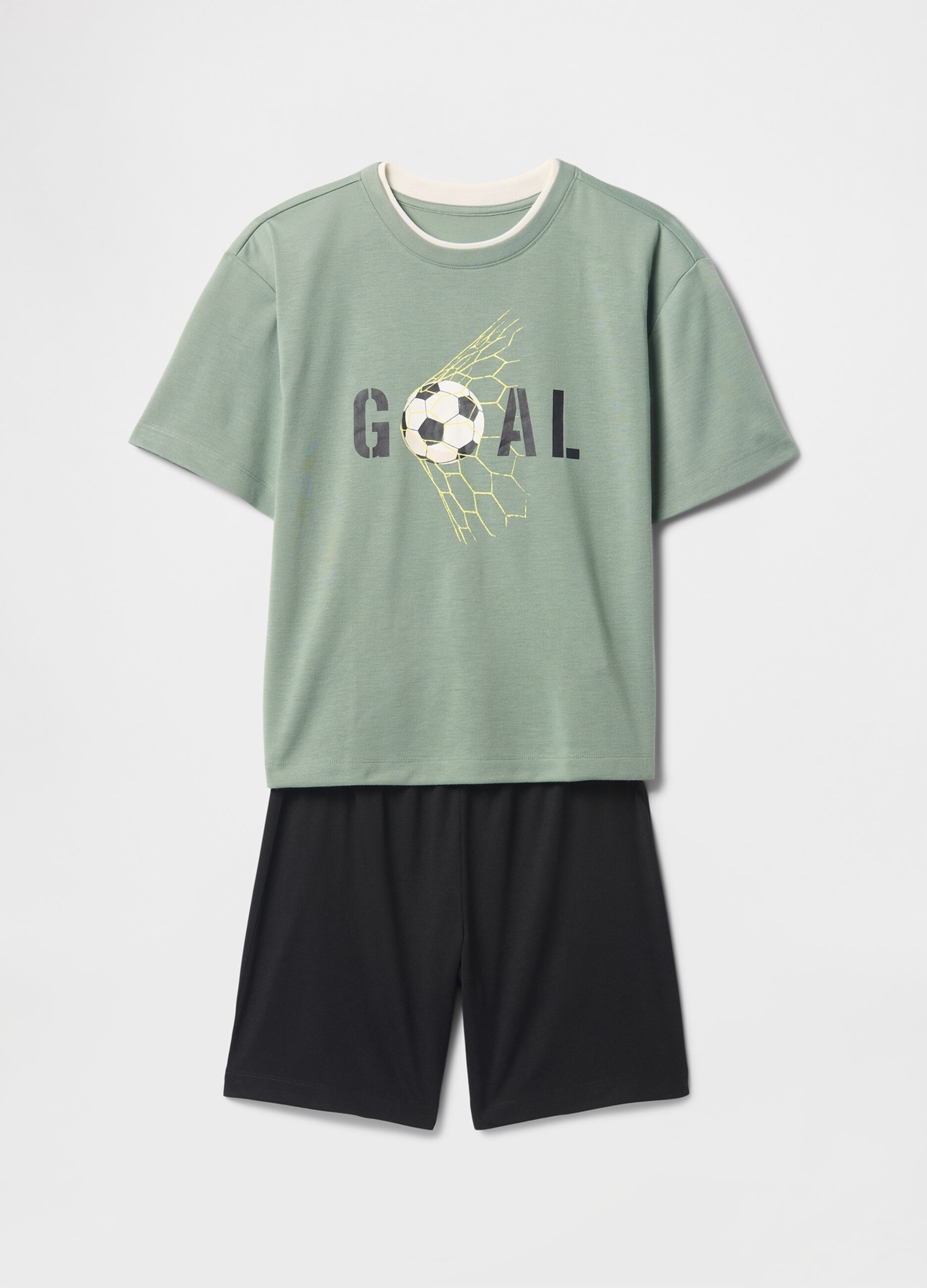 Pigiama verde a tema calcio per bambino