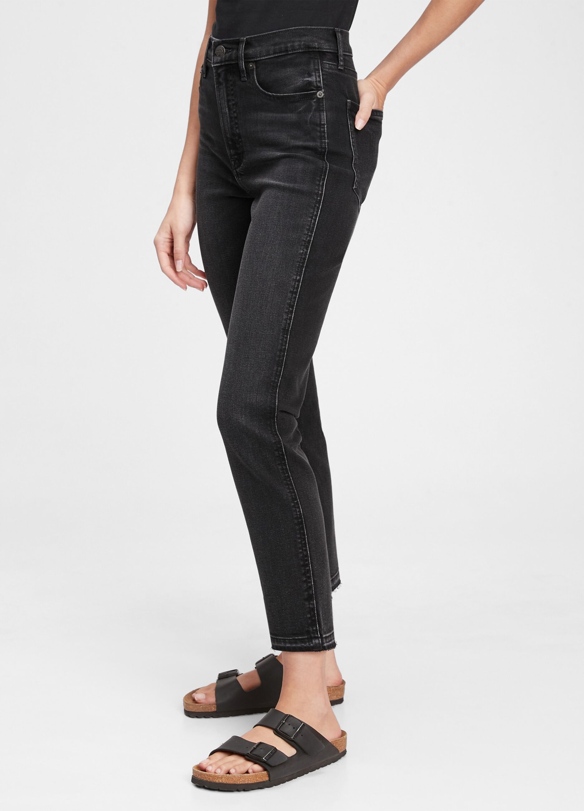 Jeans slim fit a vita alta con orlo a vivo