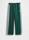 Green knitted trousers for children_3