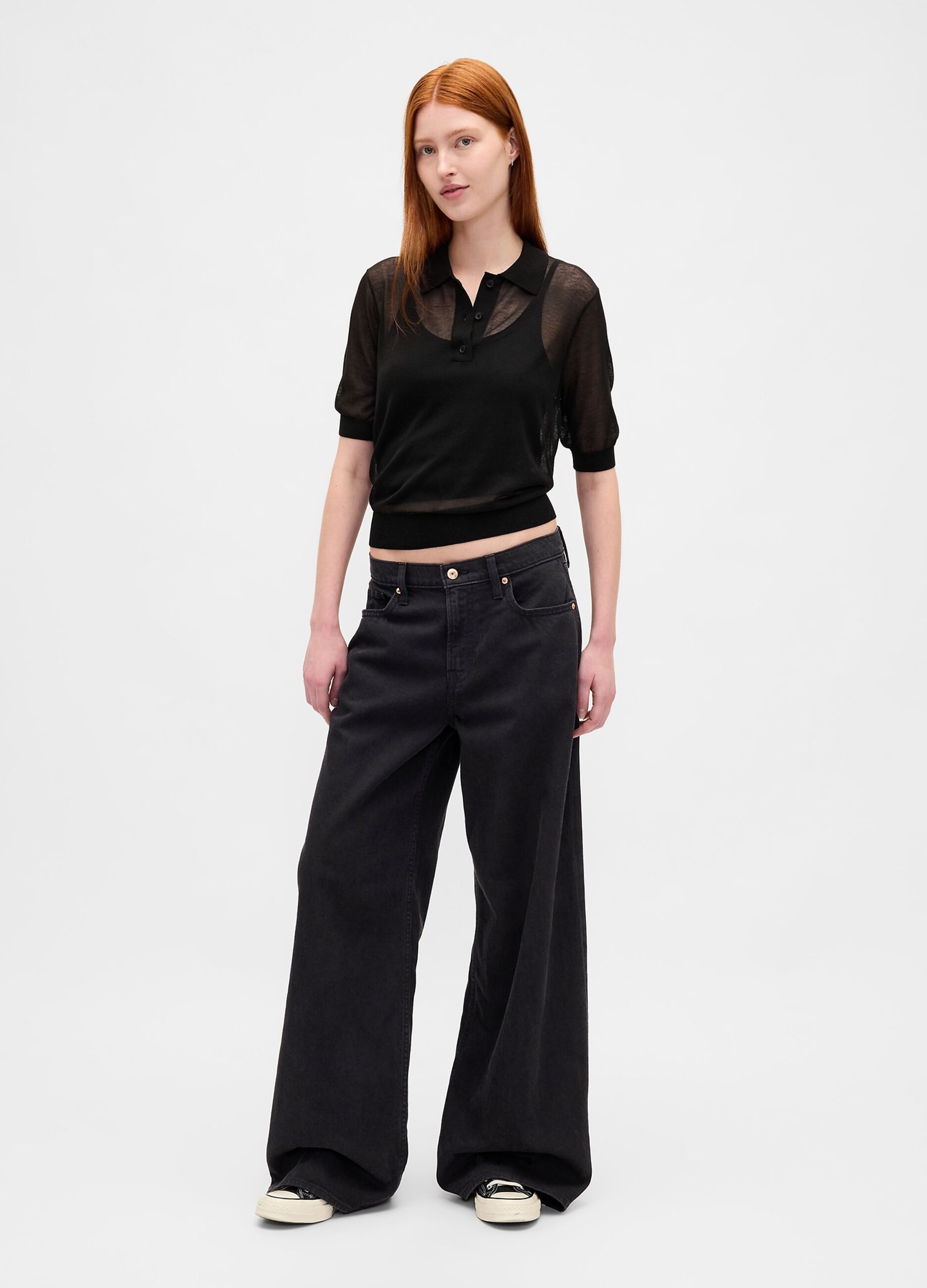 Polo nera in misto acrilico