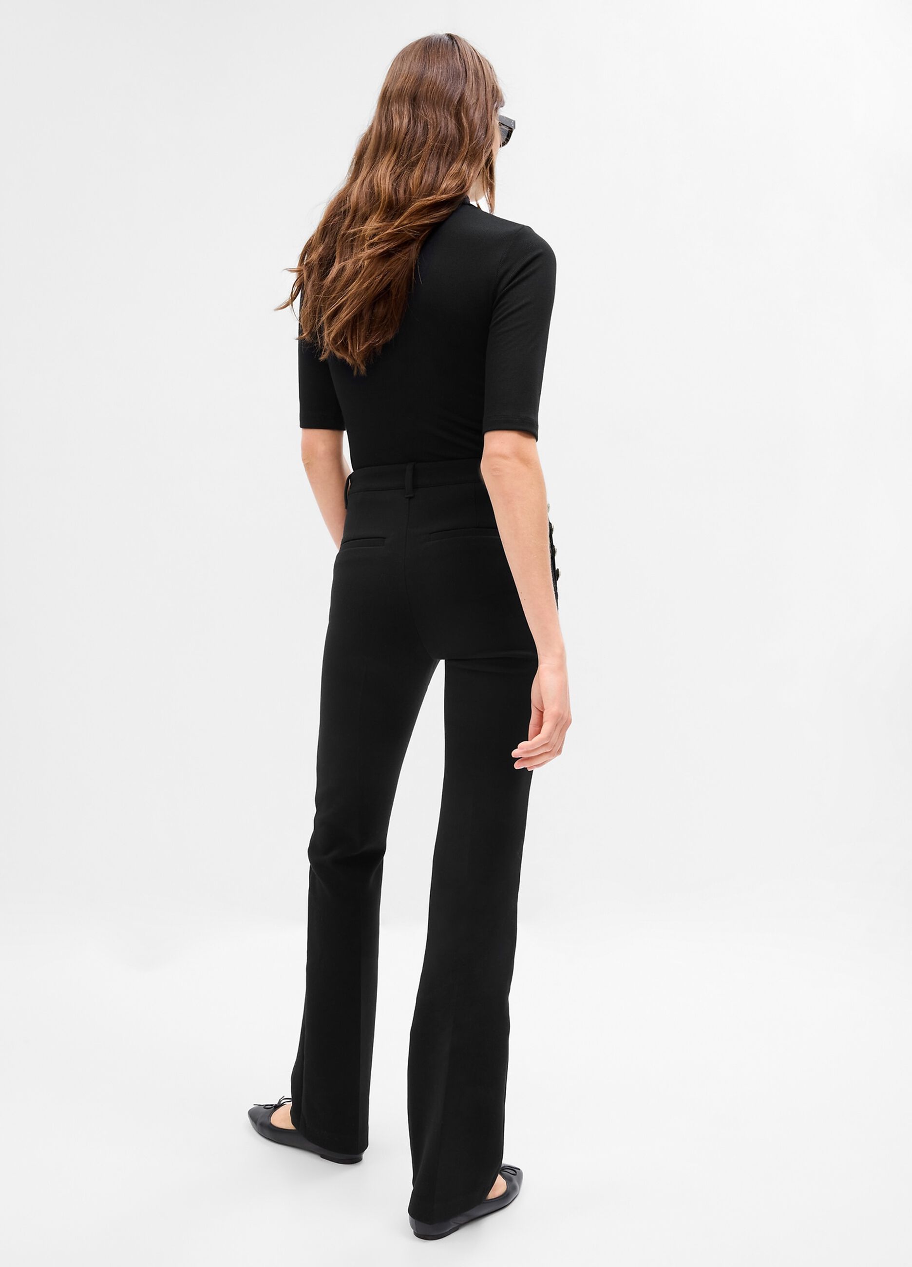 Pantaloni flare fit con bottoni dorati_1