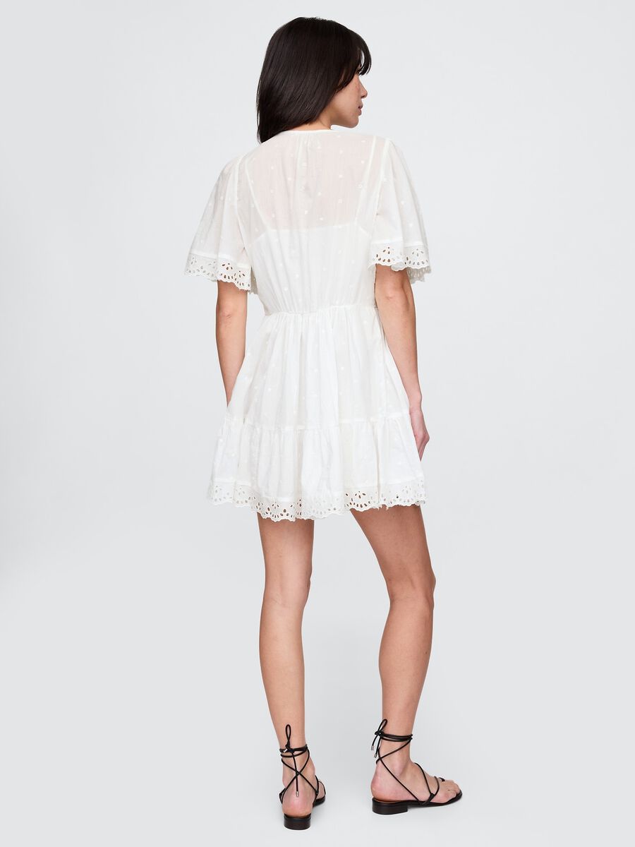 Abito corto bianco in tessuto ricamato Donna_1