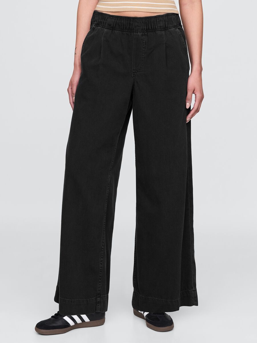 Pantaloni larghi neri con tasche Donna_1