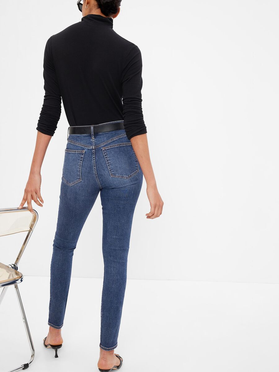 High-waisted skinny-fit jeans with worn look Woman_1