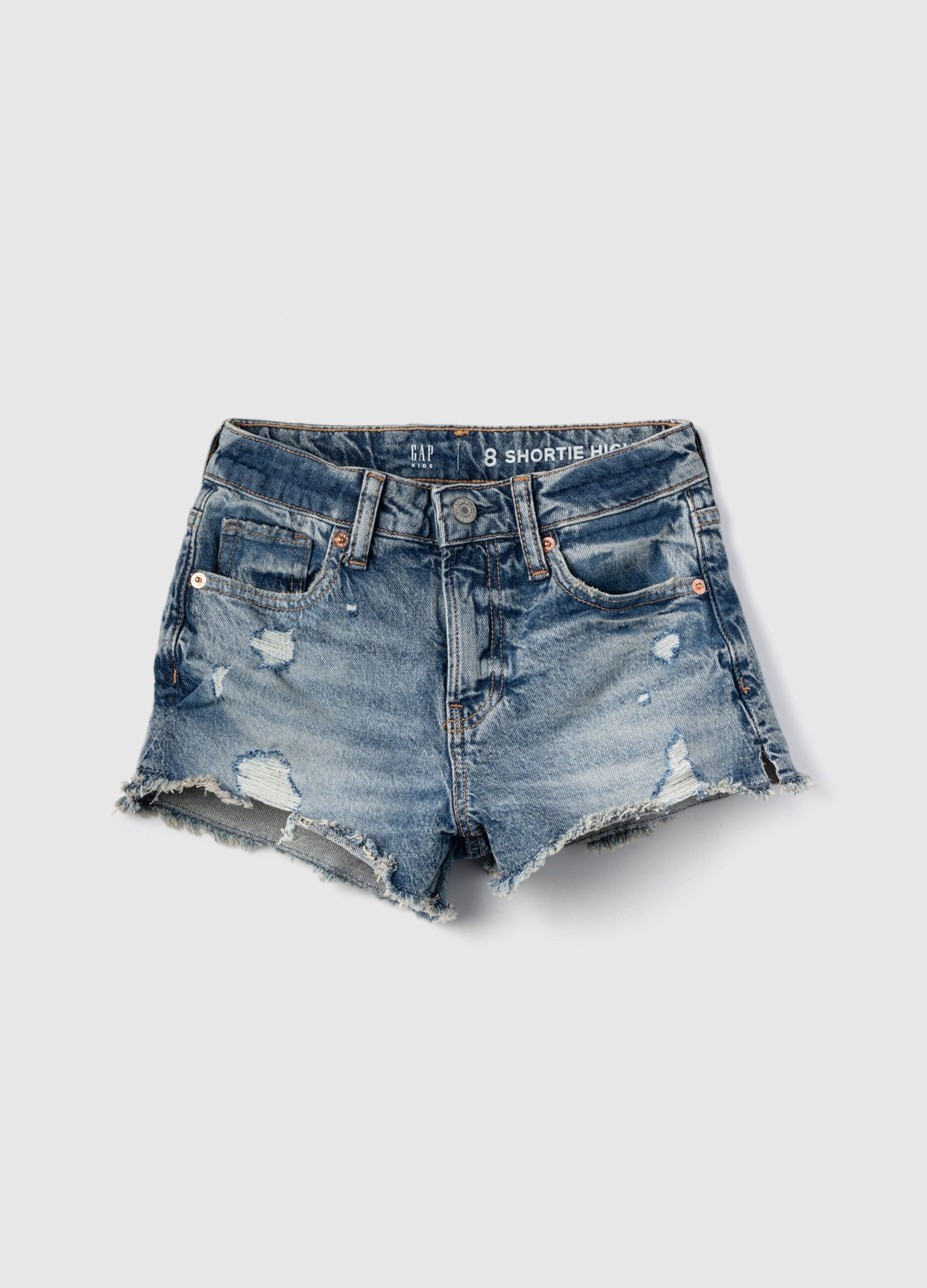 High-rise shorts with abrasions in denim
