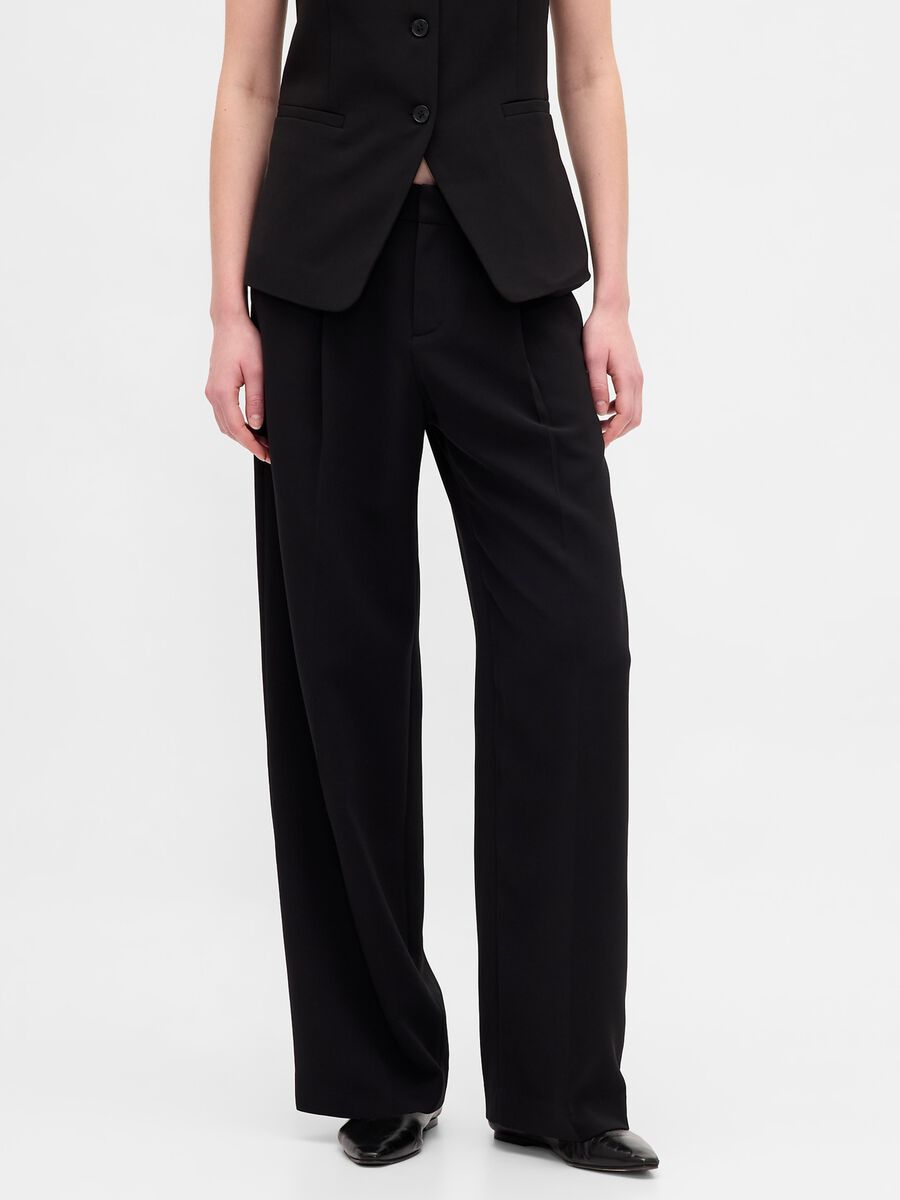 Pantaloni neri elasticizzati a gamba larga Donna_1