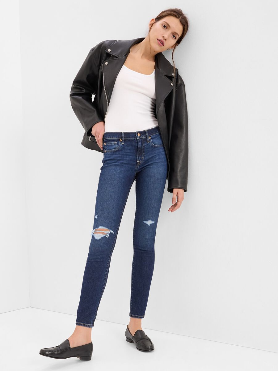 Jeans skinny fit con abrasioni Donna_0