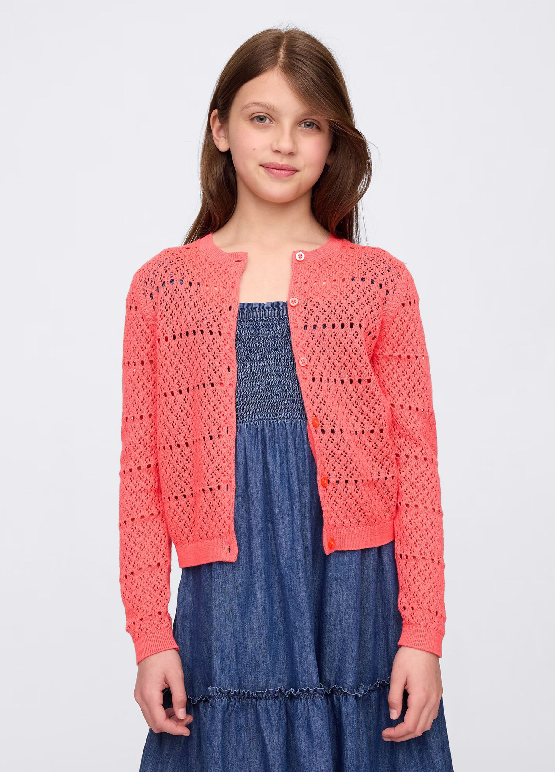 Cardigan rosa con lavorazione traforata