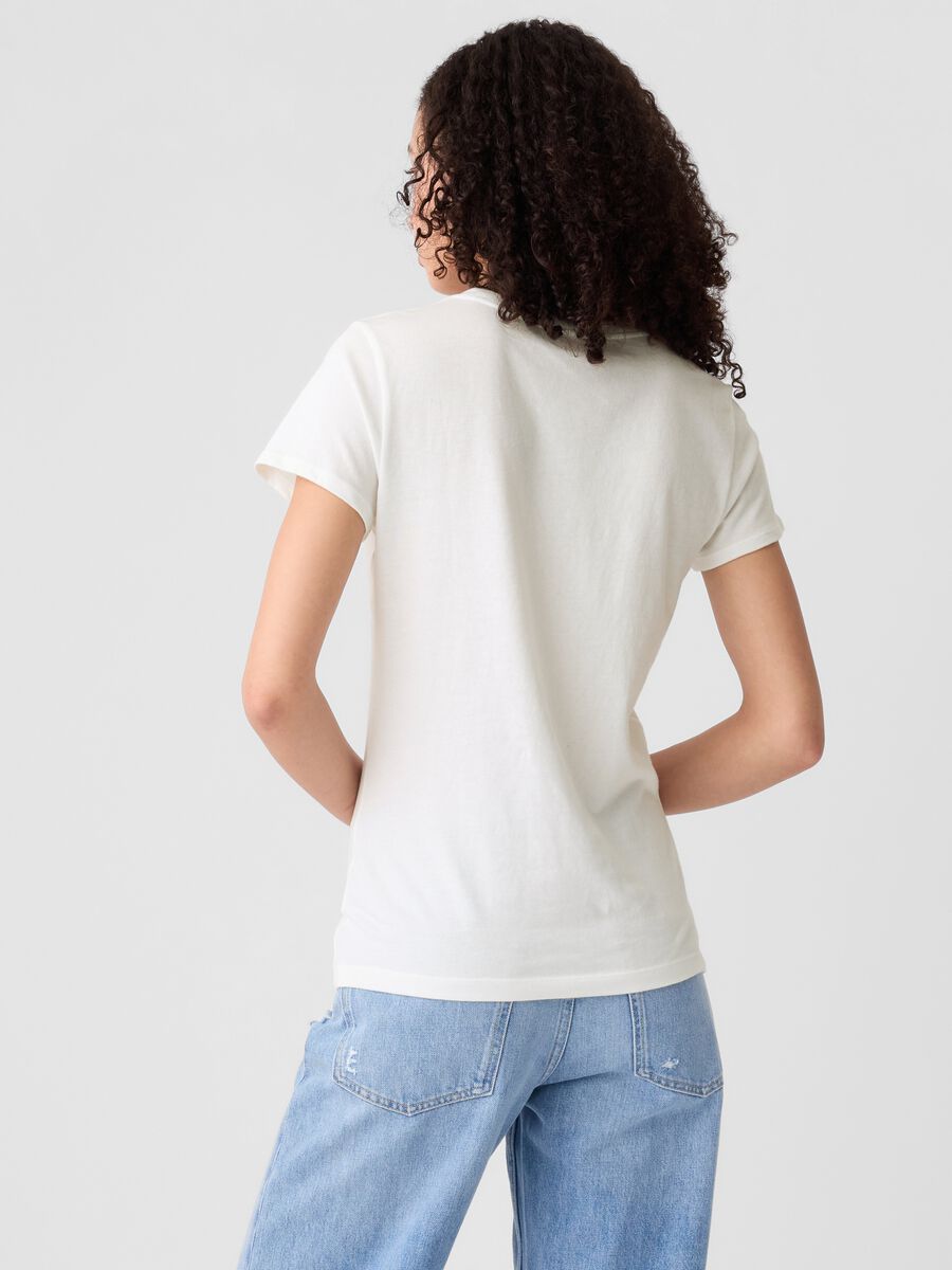 T-shirt con stampa logo floreale Donna_1