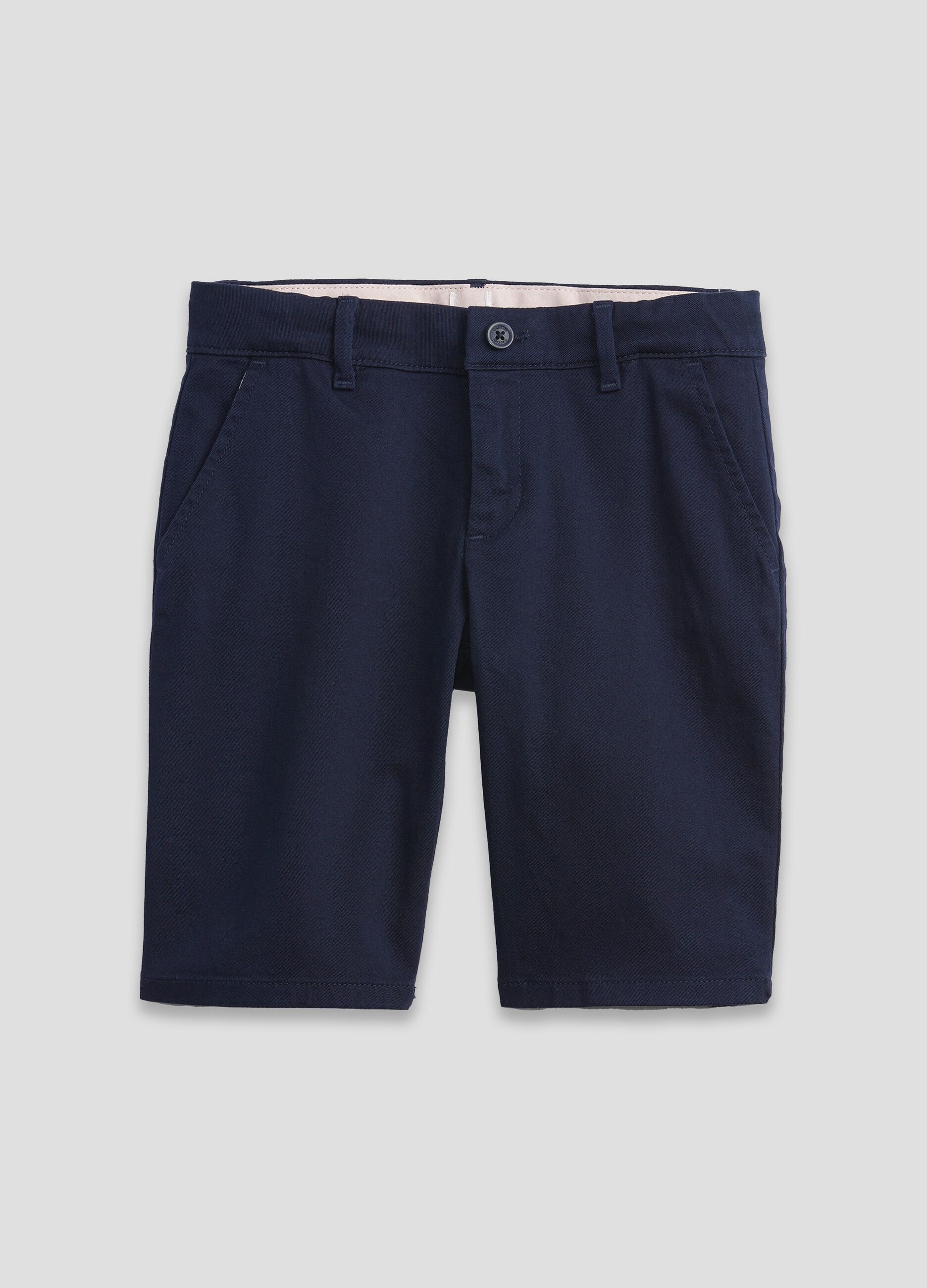 Solid colour Bermuda shorts with pockets