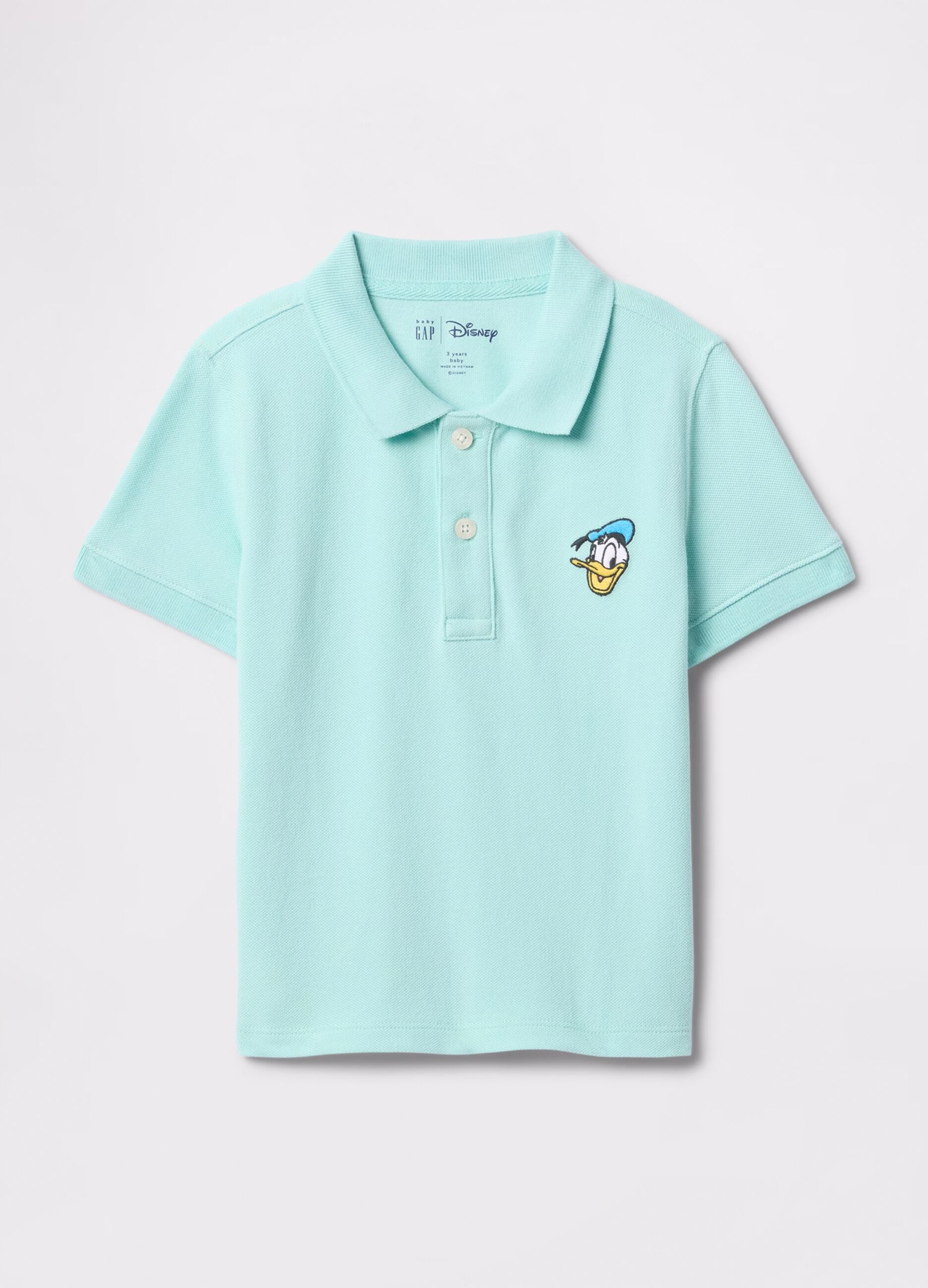 Polo azzurra in cotone con ricamo Paperino