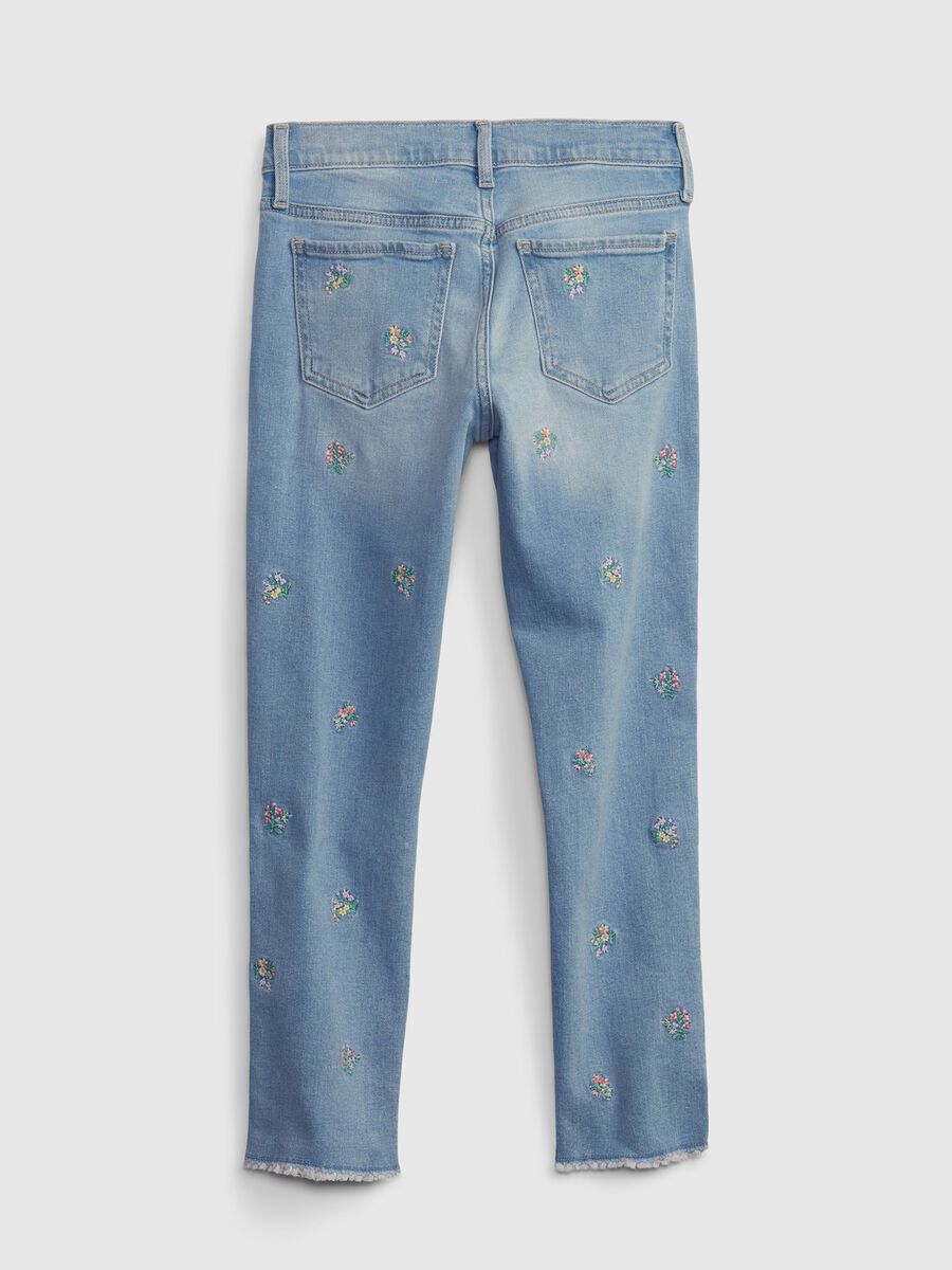 Jeans slim fit con ricamo fiori Bambina_1