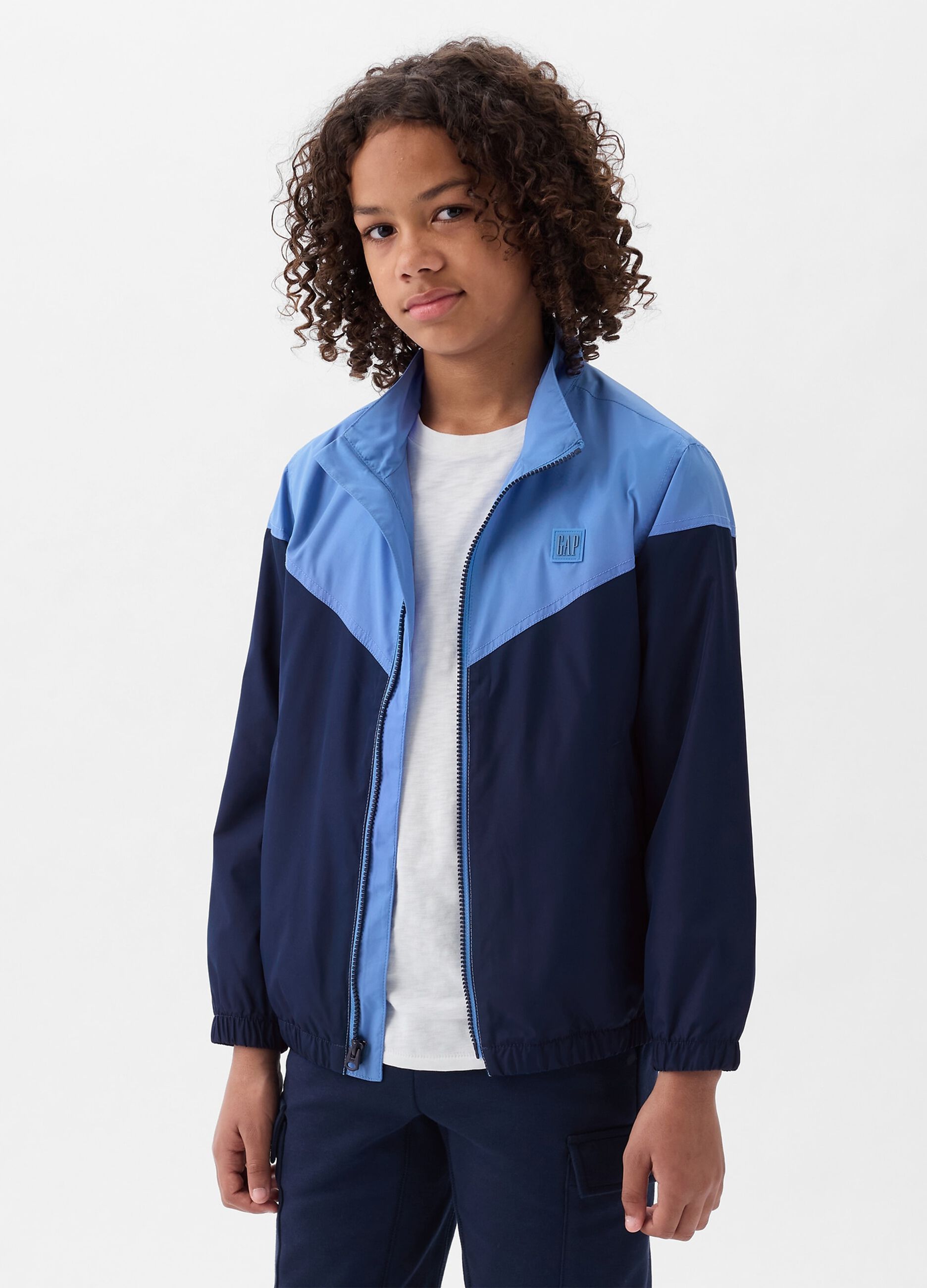 Two-tone windbreaker with logo patch