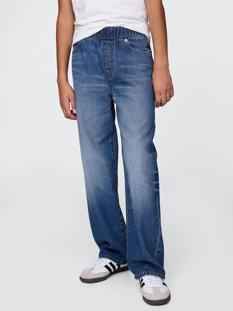 Jeans blu denim ampi a vita elastica Bambino_1