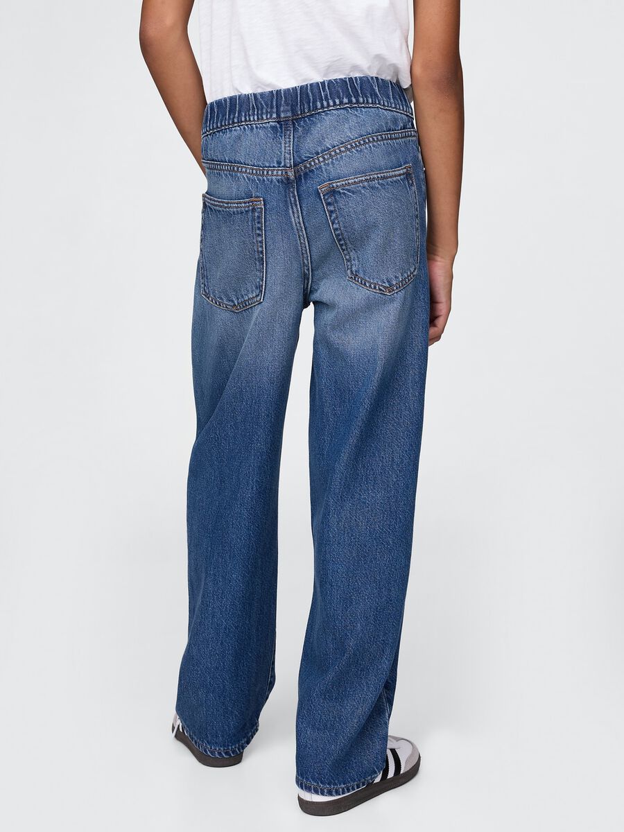Jeans blu denim ampi a vita elastica Bambino_2