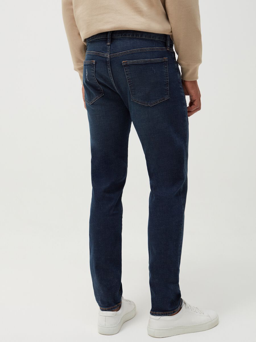 Slim fit jeans with rips Man_2