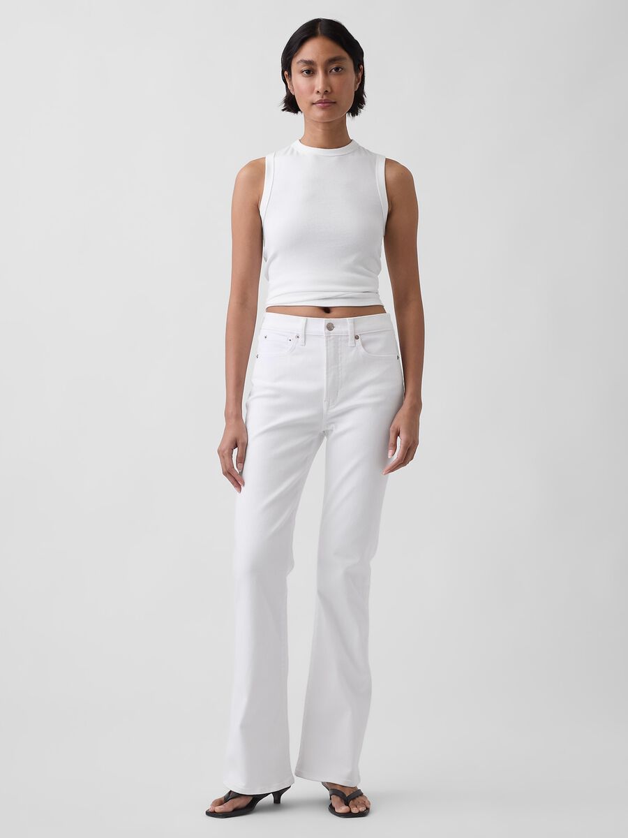 Jeans in cotone elasticizzato a gamba svasata Donna_0