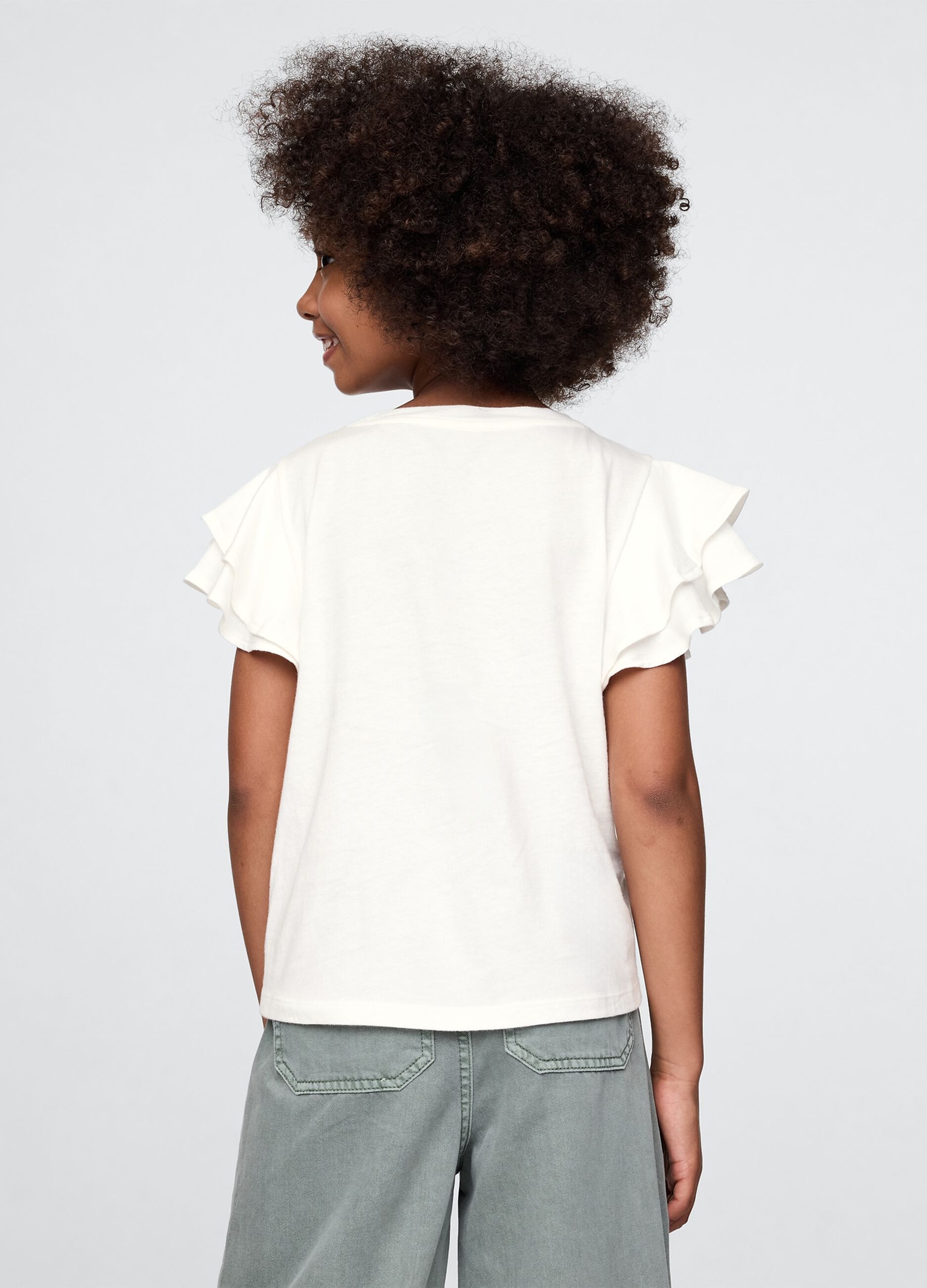 T-shirt a maniche corte bianca con volant e stampa floreale_1