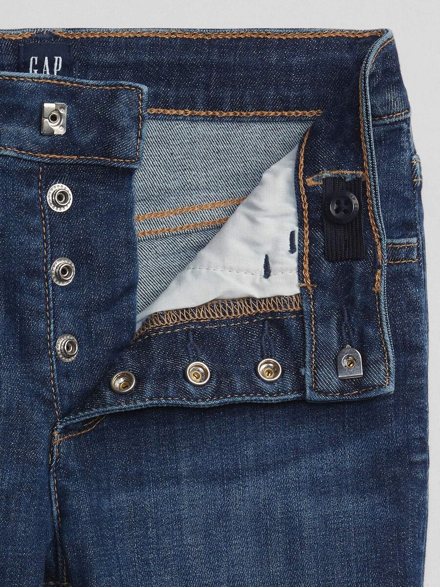 Jeans slim fit con bottoni automatici Bambina_3